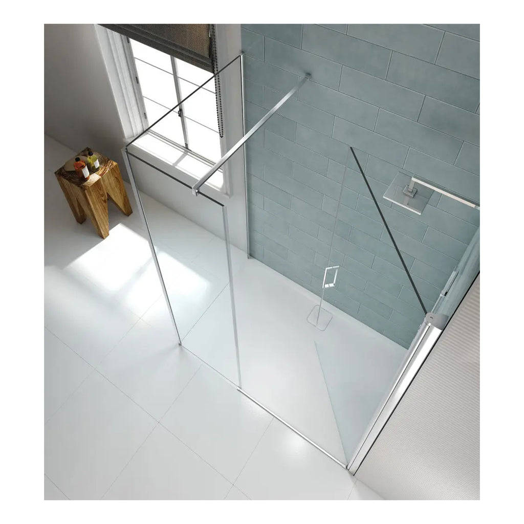 Sliding glass shower door, modern bathroom with grey tiles, minimalistic design, spacious shower enclosure, natural light in bathroom, contemporary bathroom decor, streamlined shower screen, shower enclosure with black handle, sleek bathroom fixtures, stylish wet room design, clean and airy bathroom space.