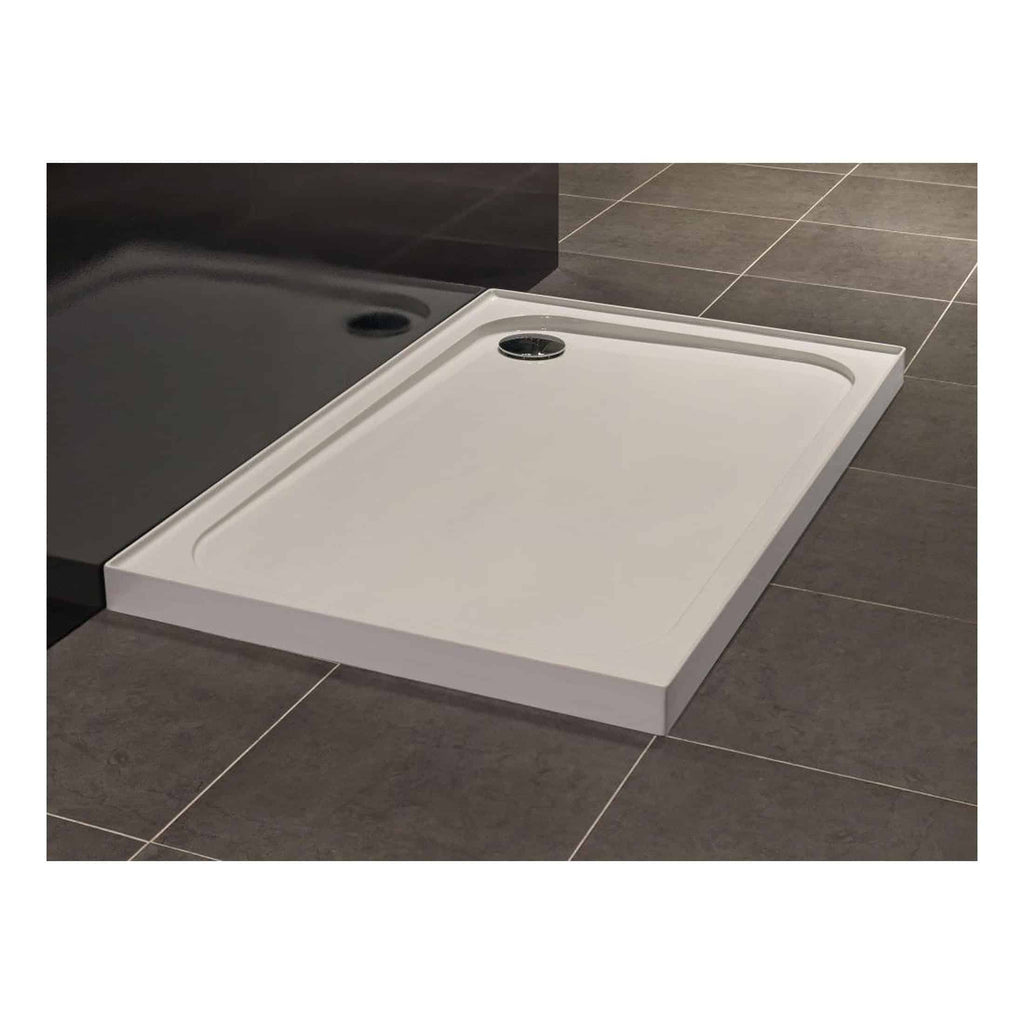 Modern white shower tray with a built-in drain and slightly raised edges, designed for contemporary bathroom installations, providing a sleek and functional shower area.
