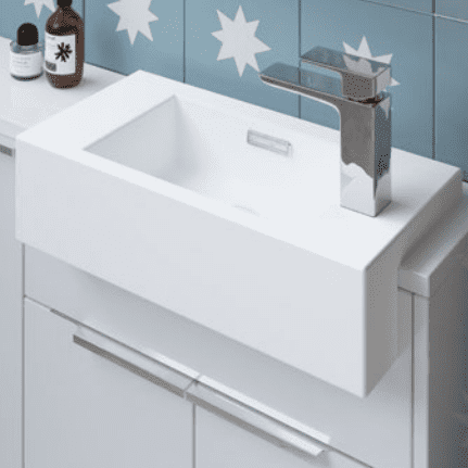 Modern white bathroom sink with sleek chrome tap, ideal for contemporary bathroom designs.