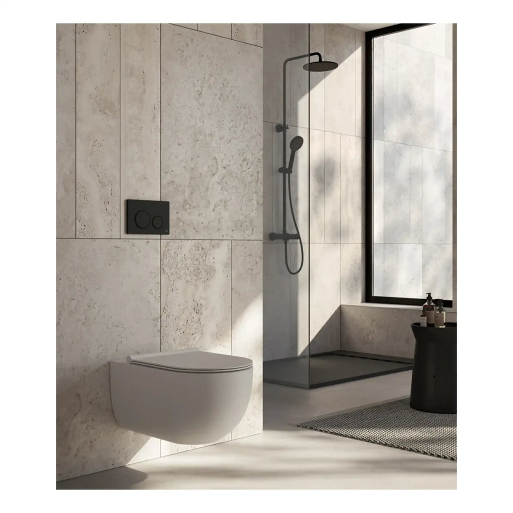 Sleek modern bathroom featuring a wall-mounted toilet, walk-in shower with black fixtures, and contemporary design elements, creating a clean and minimalist look.