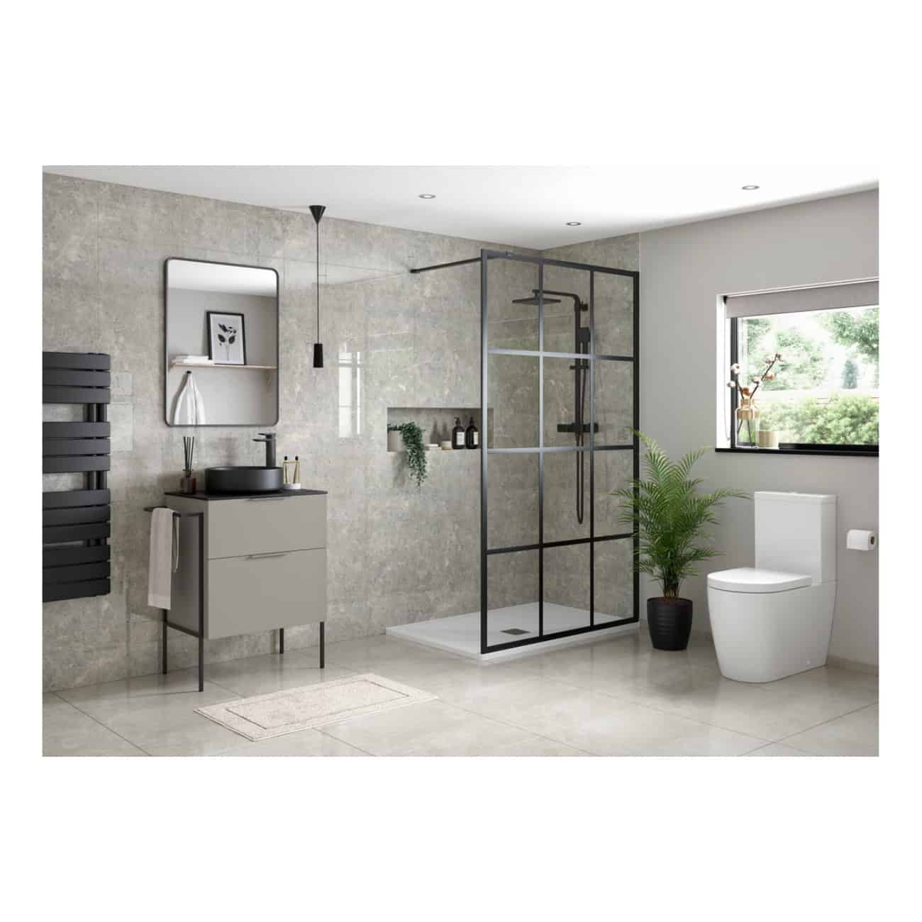 Modern bathroom with walk-in shower, white toilet, grey vanity, black-framed shower enclosure, and natural light, showcasing contemporary bathroom design ideas and stylish fixtures.