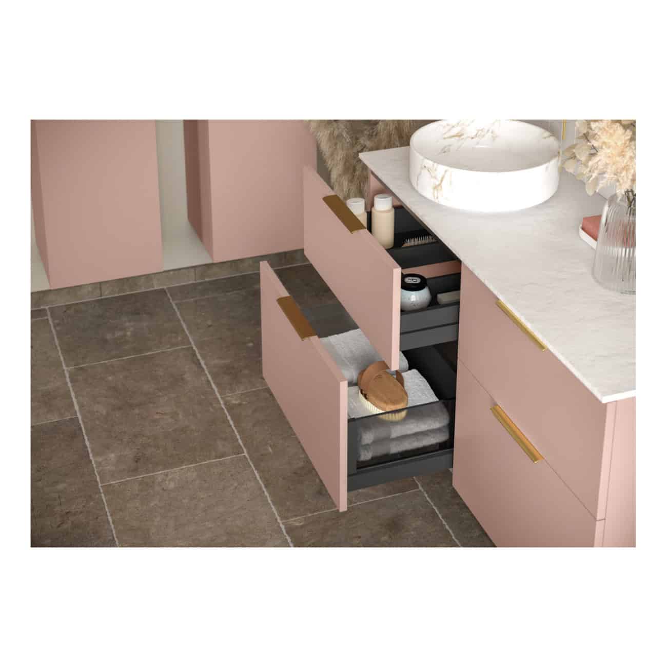 Luxurious pink bathroom vanity with open drawers showcasing organised storage for towels and toiletries, paired with elegant marble countertop sink, perfect for modern bathroom design.