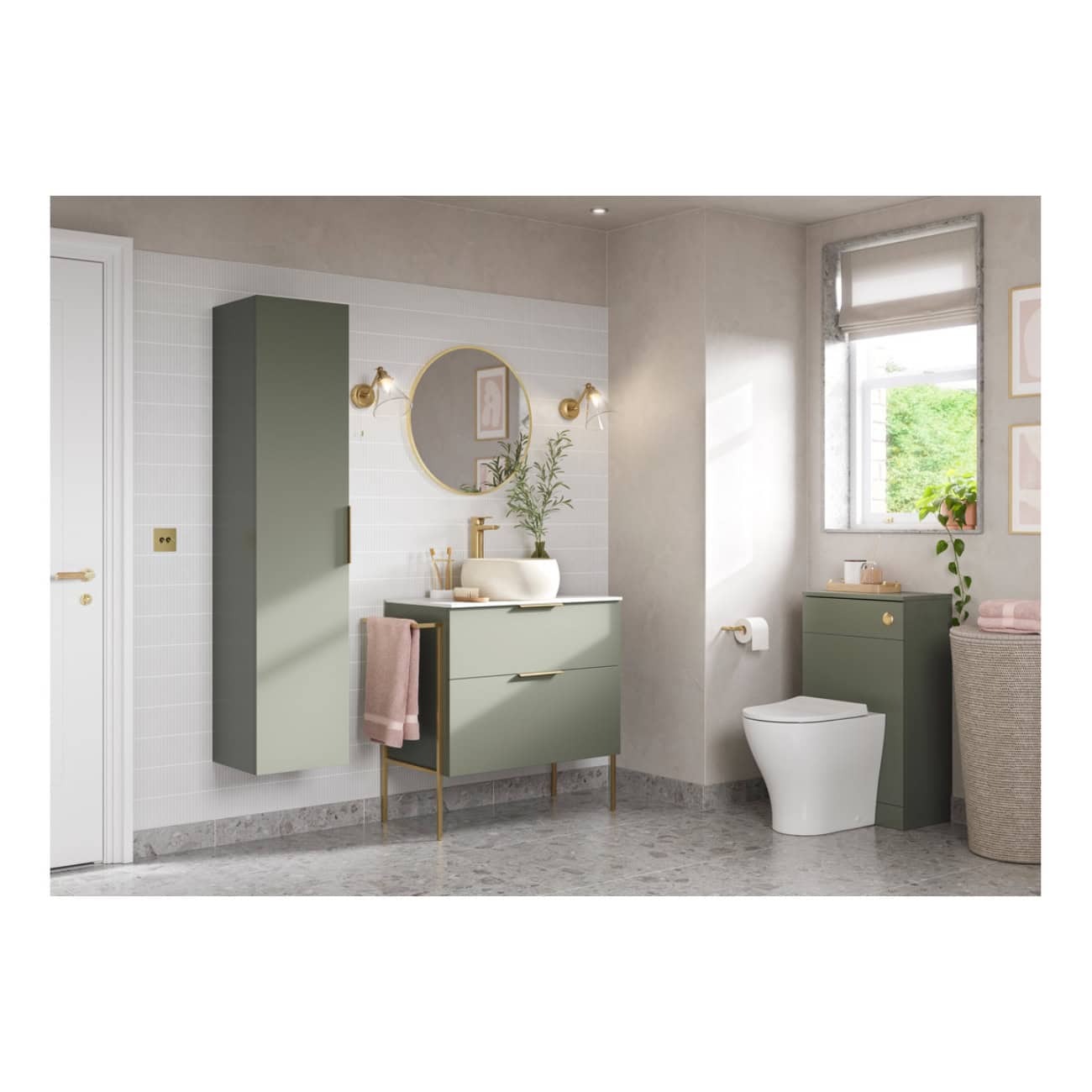 Sage green bathroom furniture including wall cabinet, vanity unit with integrated sink, and small storage cabinet with gold accents in a modern, bright bathroom with natural light.