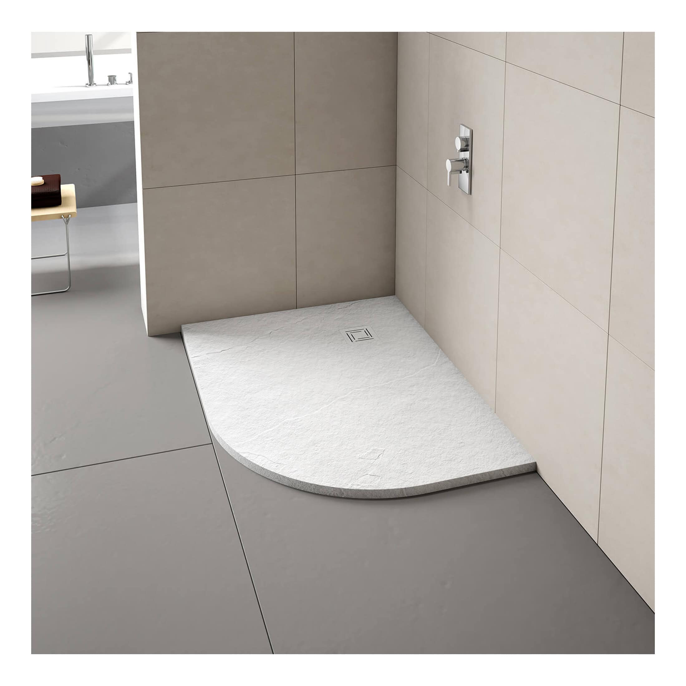 Elegant walk-in shower with a curved stone shower tray and modern chrome fixtures in a luxury bathroom setting. Perfect for contemporary bathroom designs and accessible shower solutions.