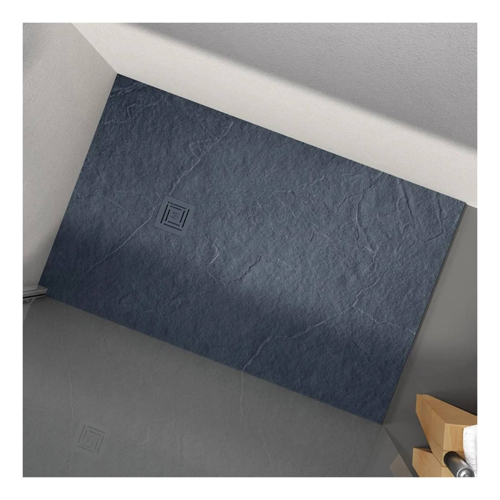 Modern blue slate shower floor with drain, perfect for stylish bathroom renovations and luxury bathroom designs, enhancing functionality and aesthetics.