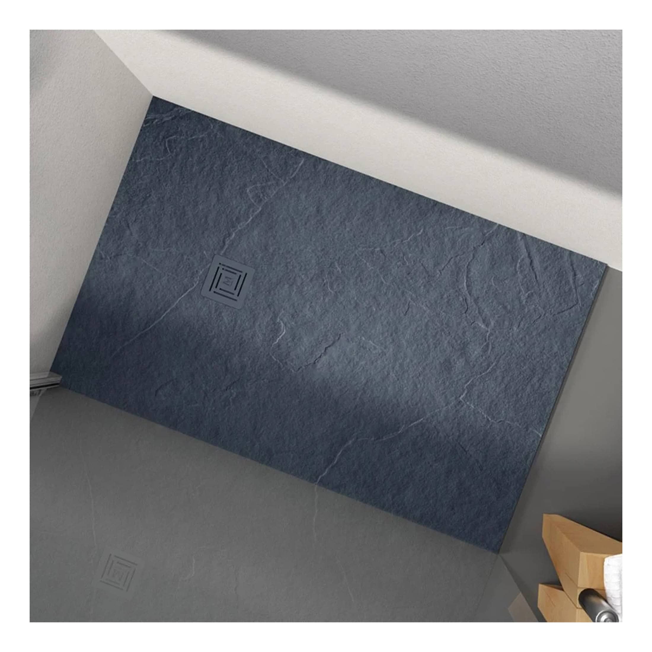 Modern blue slate shower floor with drain, perfect for stylish bathroom renovations and luxury bathroom designs, enhancing functionality and aesthetics.