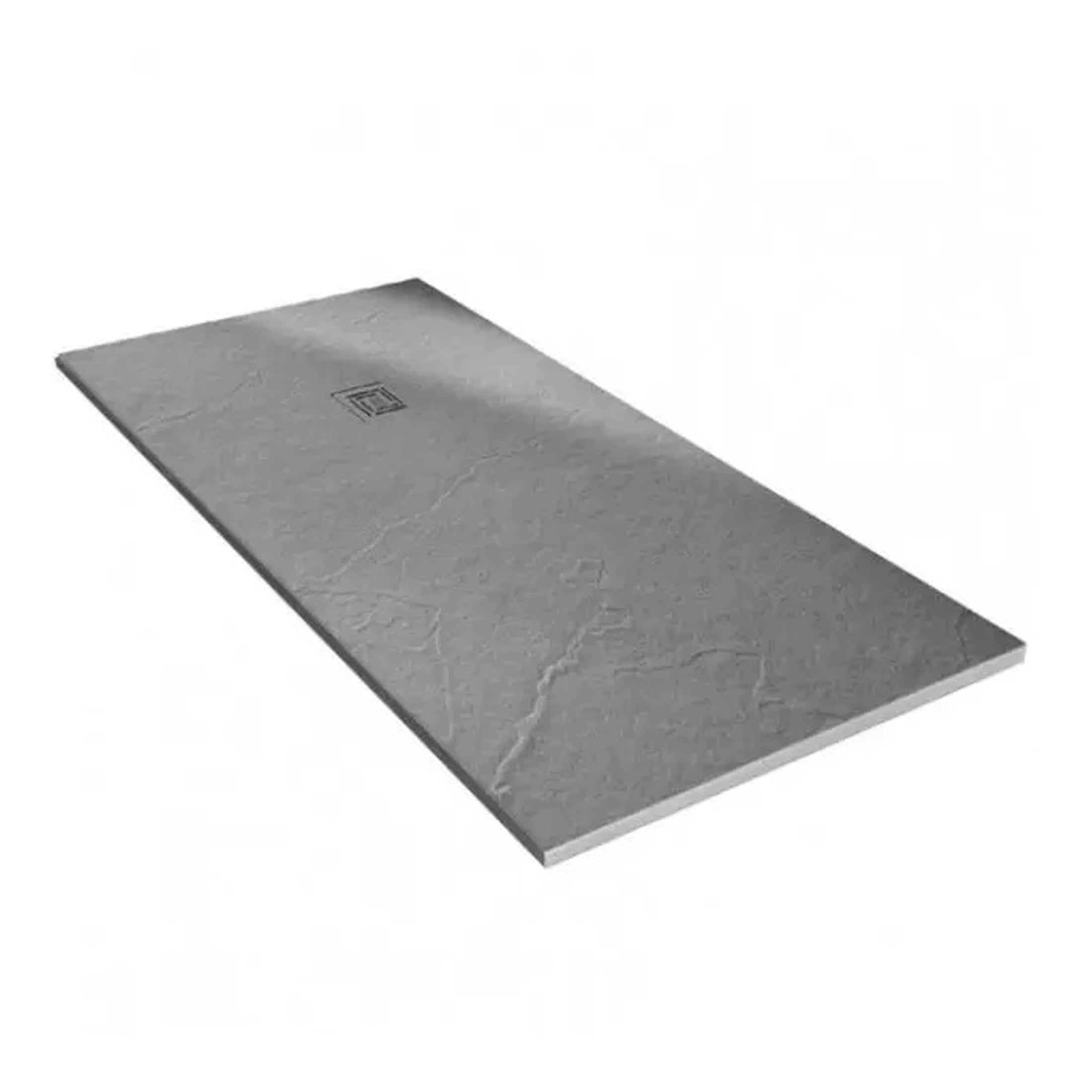 Polished grey stone shower tray with integrated drain for modern bathroom designs. Durable, sleek, and slip-resistant, ideal for stylish and functional bathroom remodels.