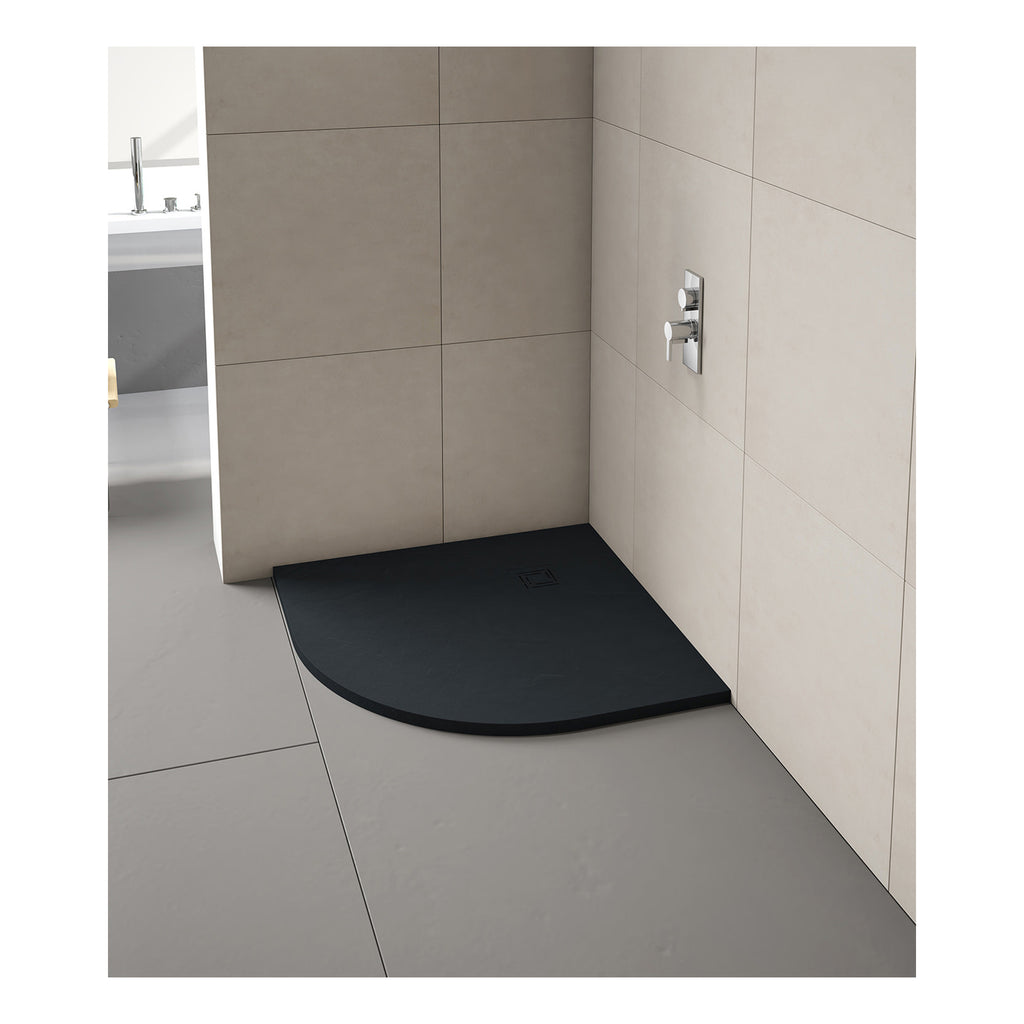 Modern black shower tray with a rounded front in a contemporary bathroom setting. Perfect for walk-in showers with minimalist design and sleek fixtures.
