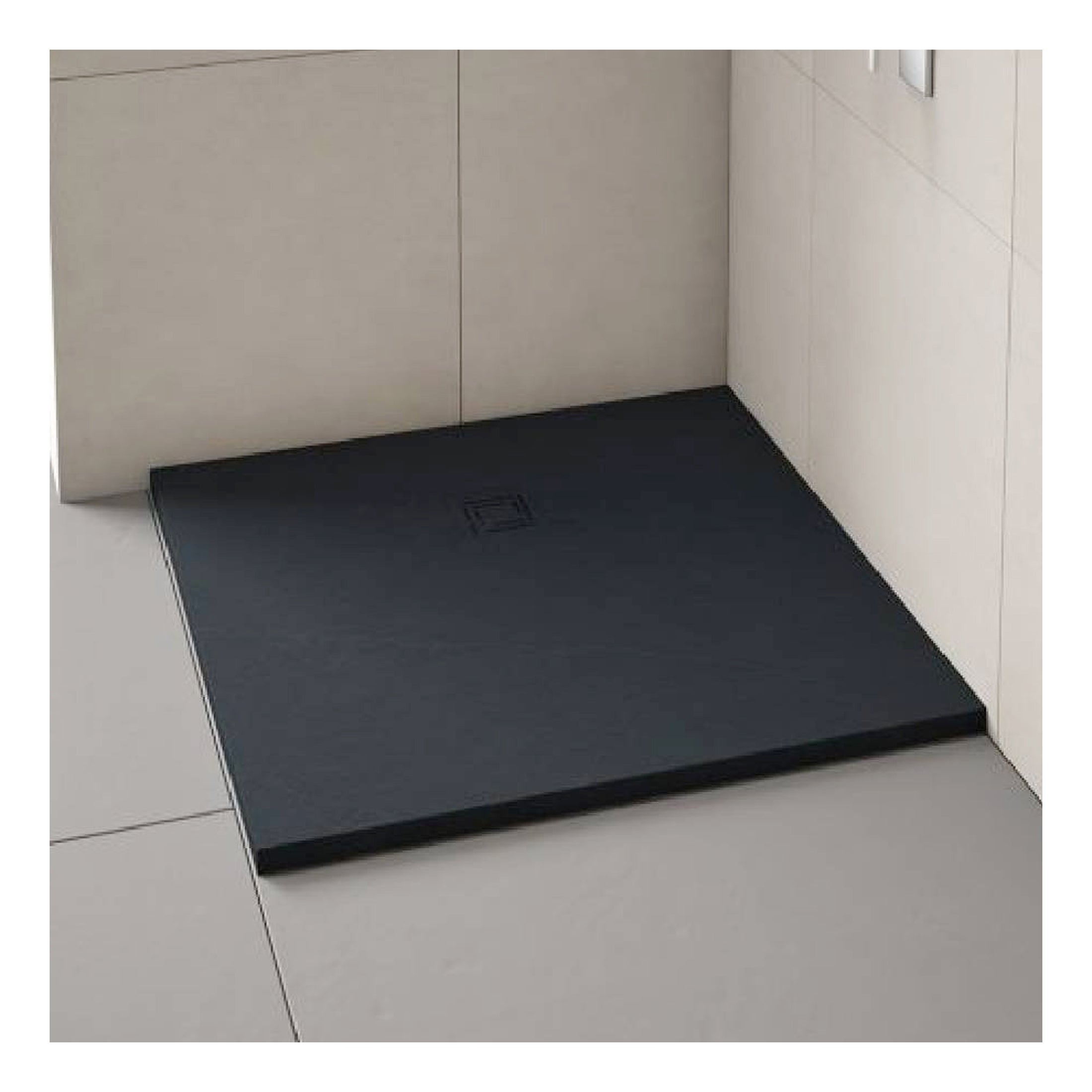 Non-slip black shower tray with modern flat design on tiled bathroom floor. Suitable for walk-in shower areas, providing safety and contemporary aesthetics in Bubly Bathrooms.