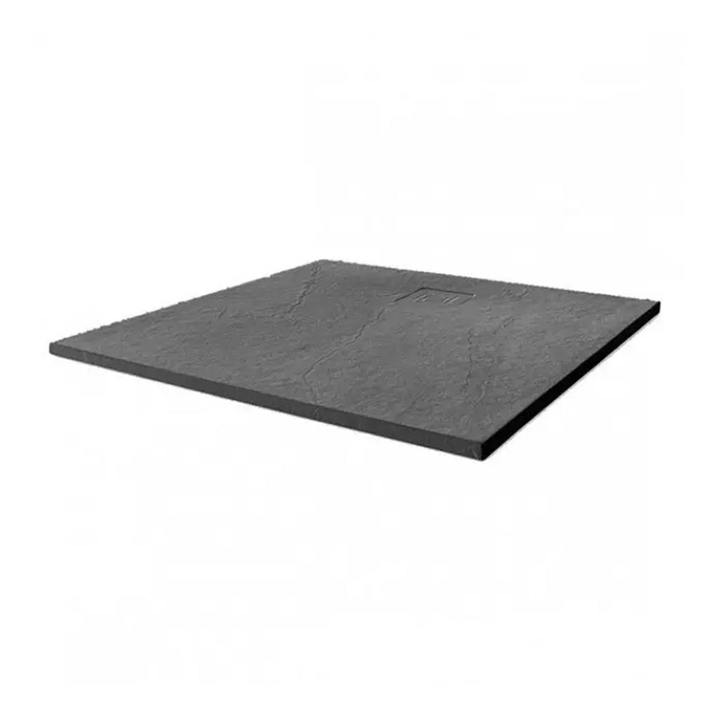 Slate shower tray with textured surface and integrated drain for modern bathroom installations. Durable, slip-resistant, and sleek design ideal for contemporary bathroom layouts.