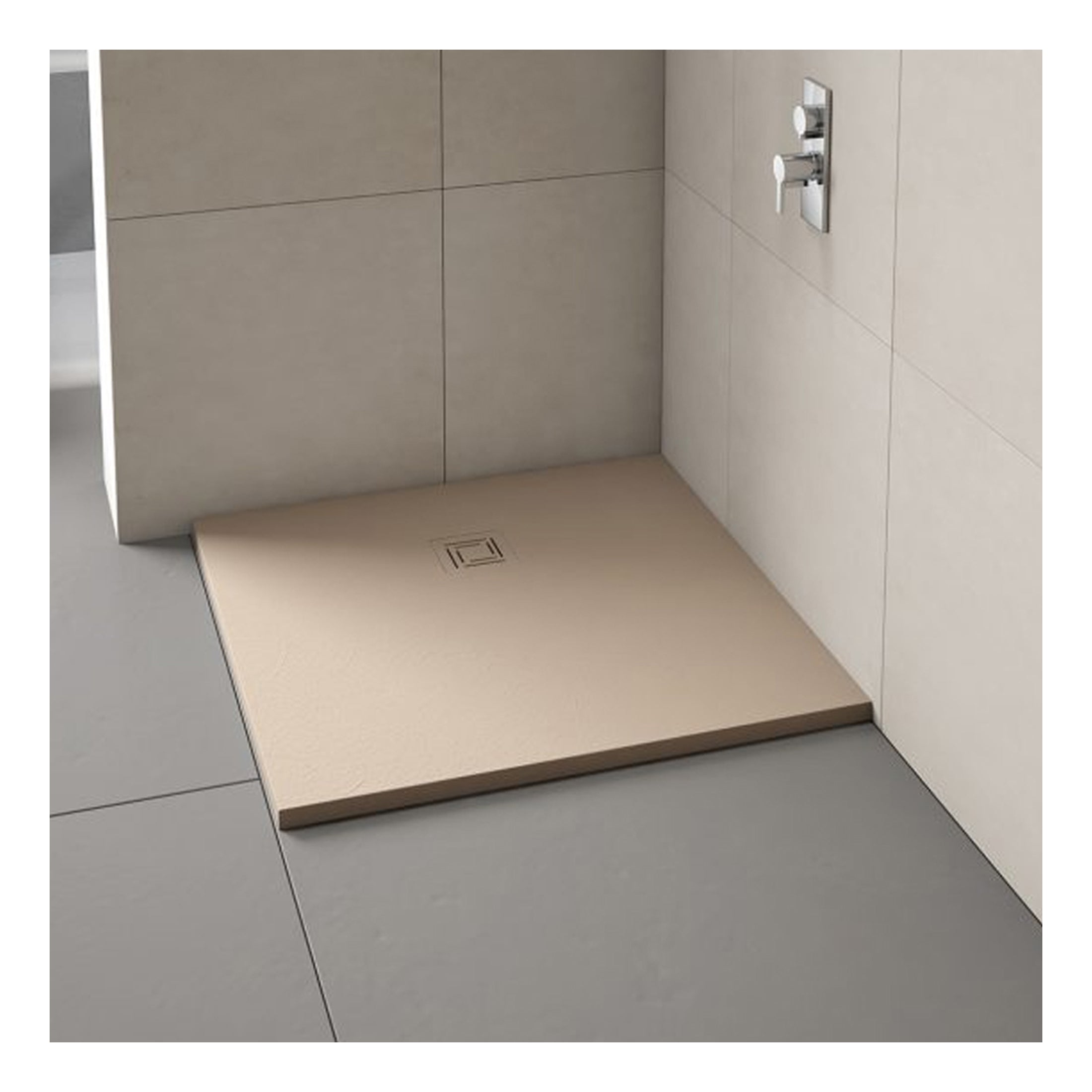 Smooth beige shower tray with a square drain, installed in a modern bathroom with large neutral tiles; perfect for contemporary bathroom design, combining functionality and style.