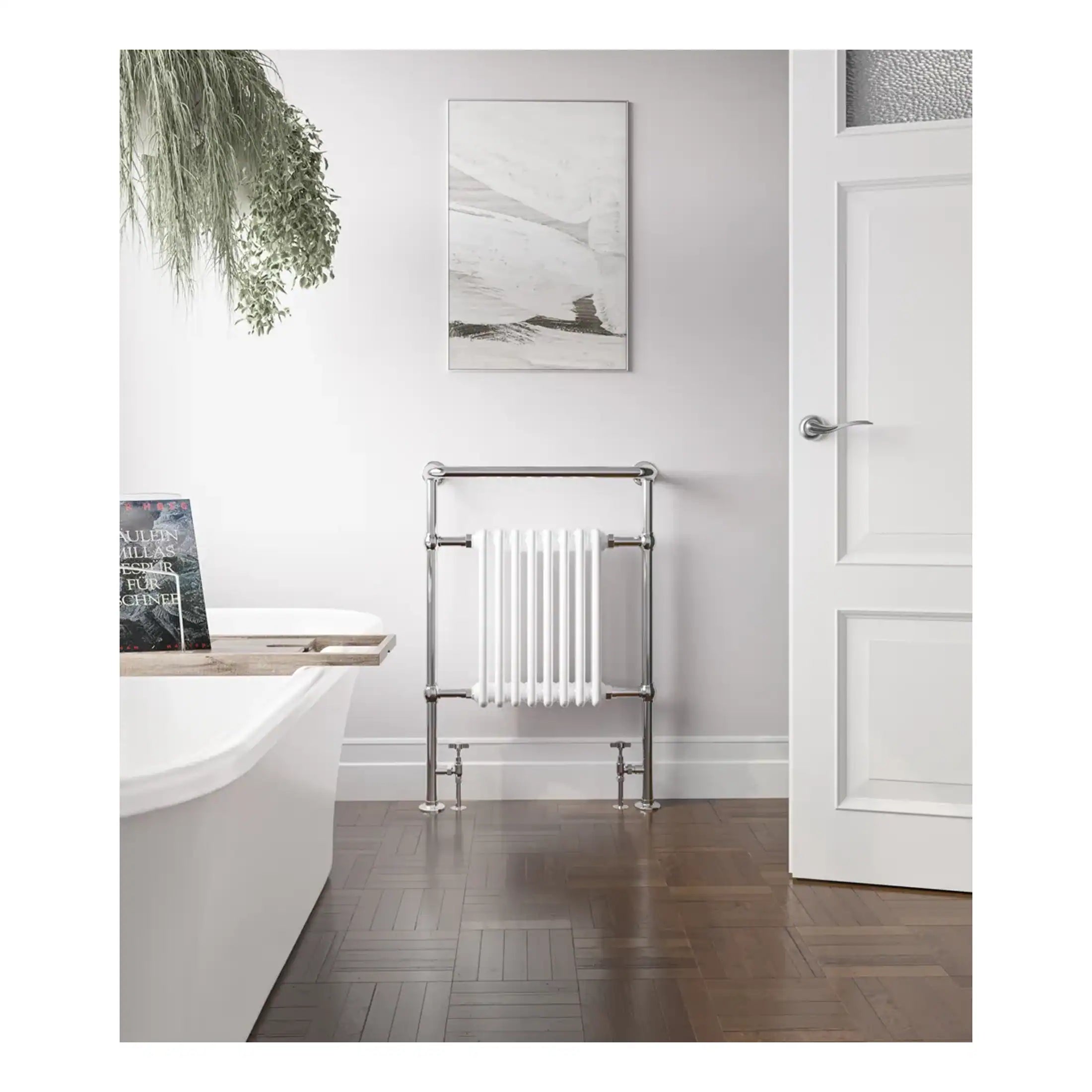 Polished chrome towel radiator in modern bathroom with white walls and wooden flooring. Elegant bathroom design with minimalist style, perfect for contemporary home decor.