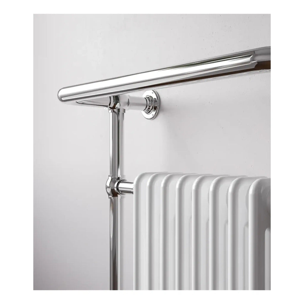 Polished chrome heated towel rail with a sleek modern design, suitable for contemporary bathrooms. Elegant and functional, perfect for warmth and style in UK bathrooms.