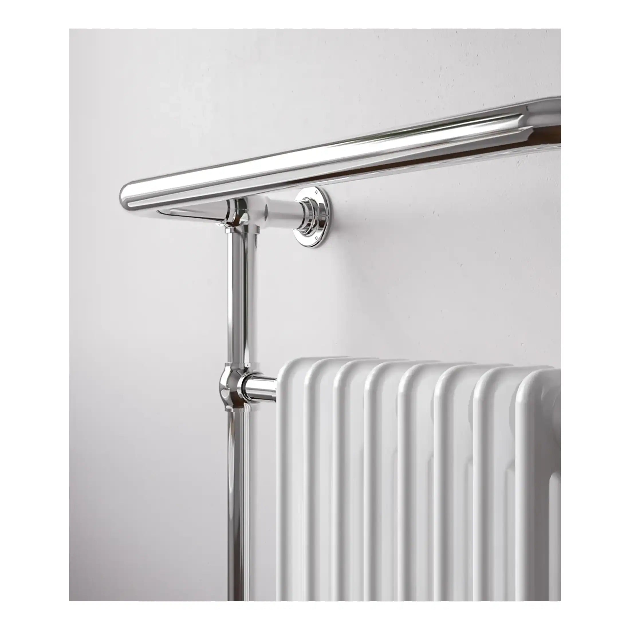 Polished chrome heated towel rail with a sleek modern design, suitable for contemporary bathrooms. Elegant and functional, perfect for warmth and style in UK bathrooms.