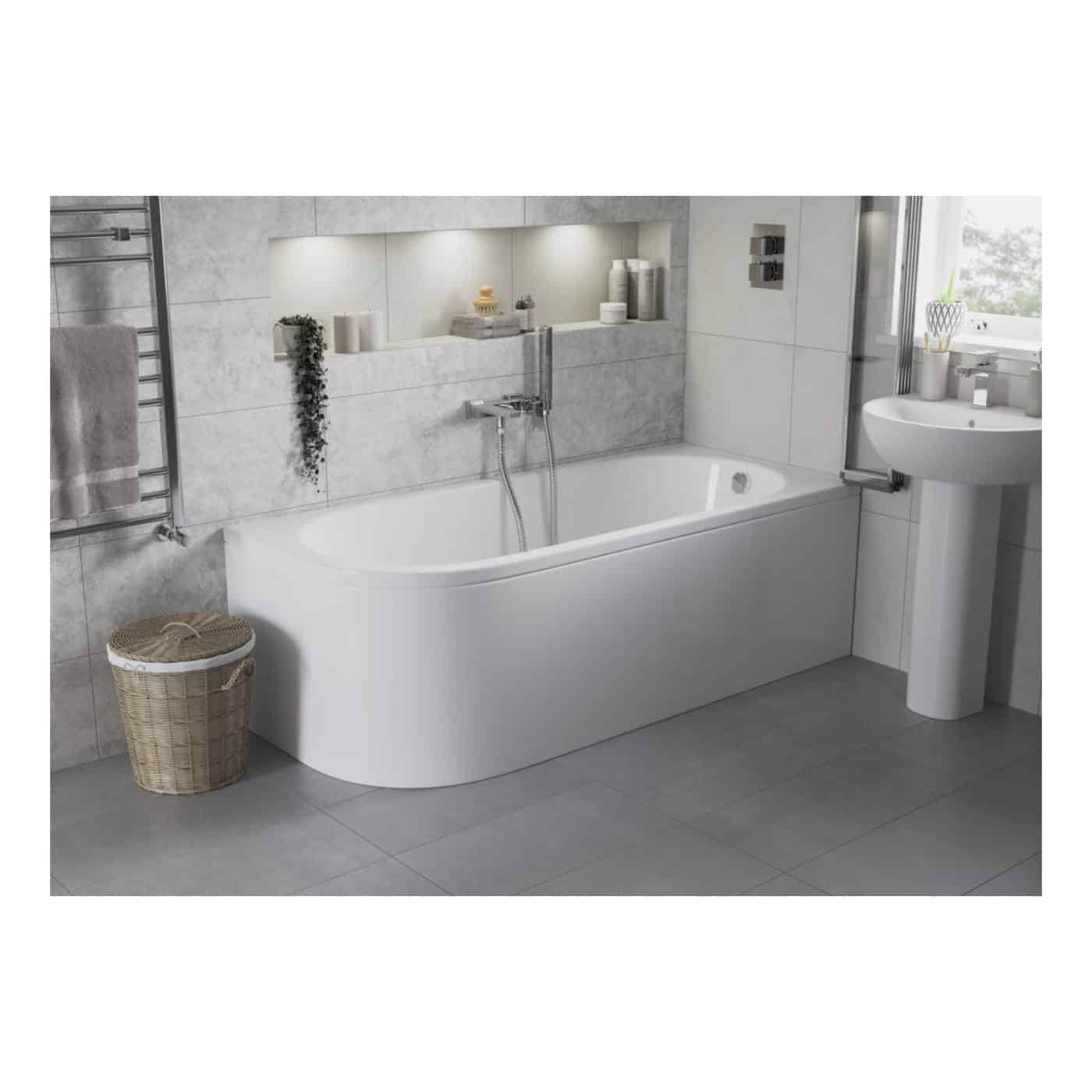 Modern white bathtub with sleek design in contemporary grey tiled bathroom, featuring a matching pedestal sink, minimalistic decor, and natural lighting. Perfect for bathroom renovation or upgrade.