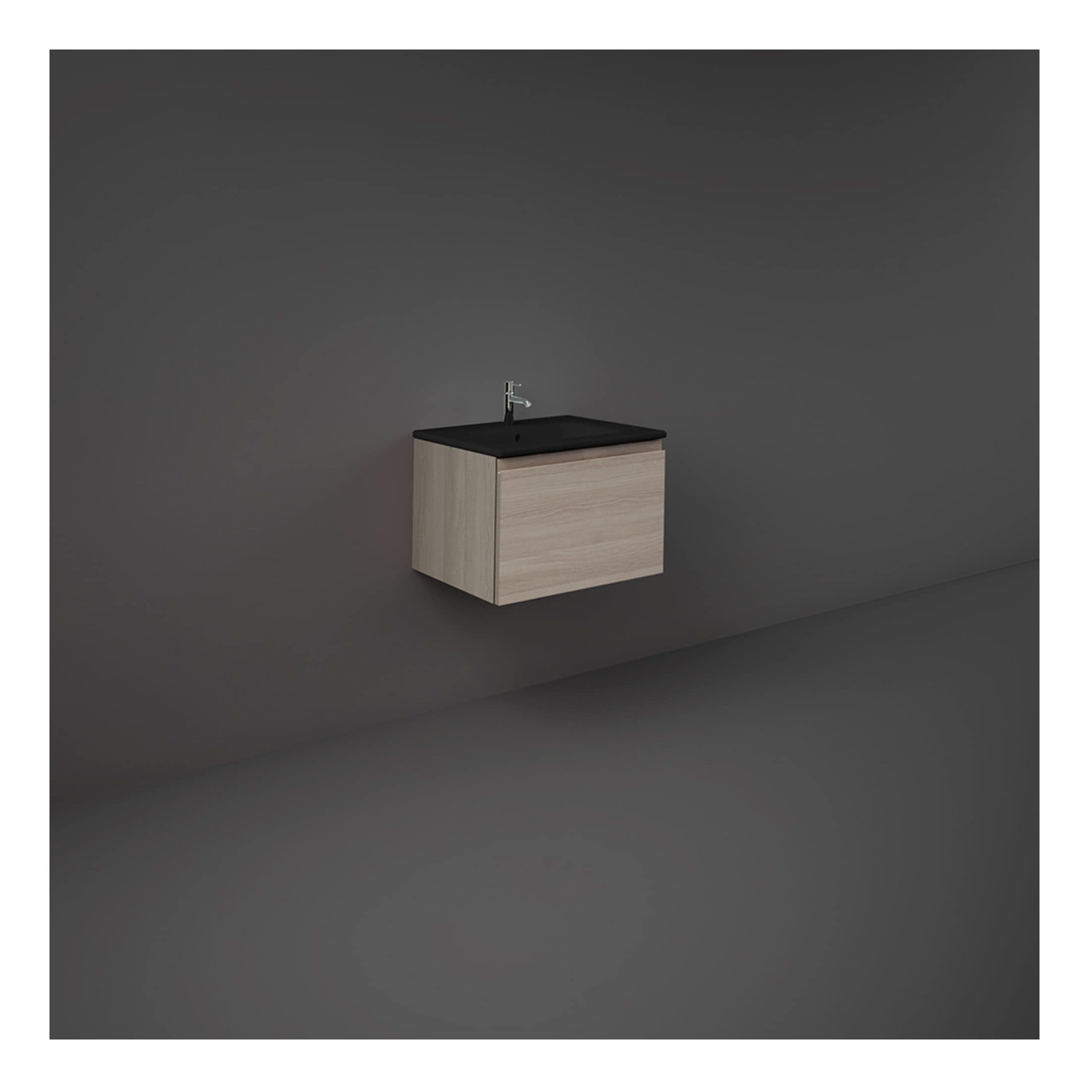 Sleek modern bathroom vanity with black countertop and wooden finish, minimalist design for contemporary bathrooms.