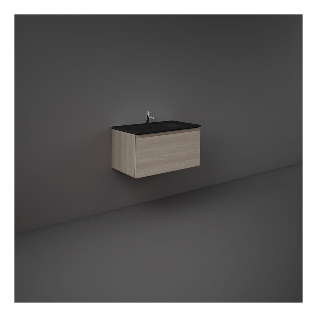 Sleek modern wall-mounted bathroom vanity unit with integrated sink and minimalist design, perfect for contemporary bathrooms. Featuring natural wood finish and black countertop for stylish bathroom storage.