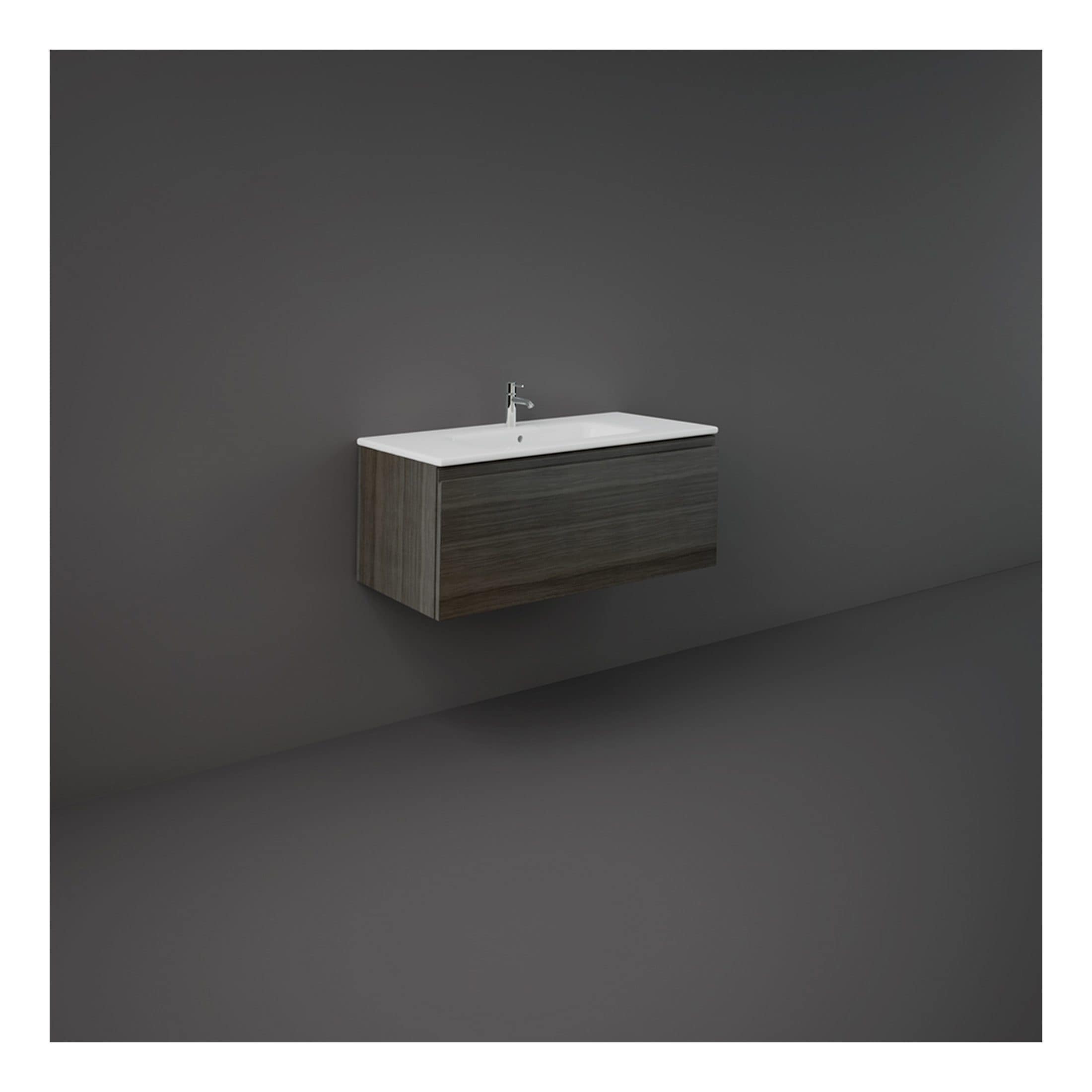 Contemporary wall-mounted bathroom vanity with integrated sink and modern tap, featuring a dark wood finish, ideal for minimalist bathroom designs.