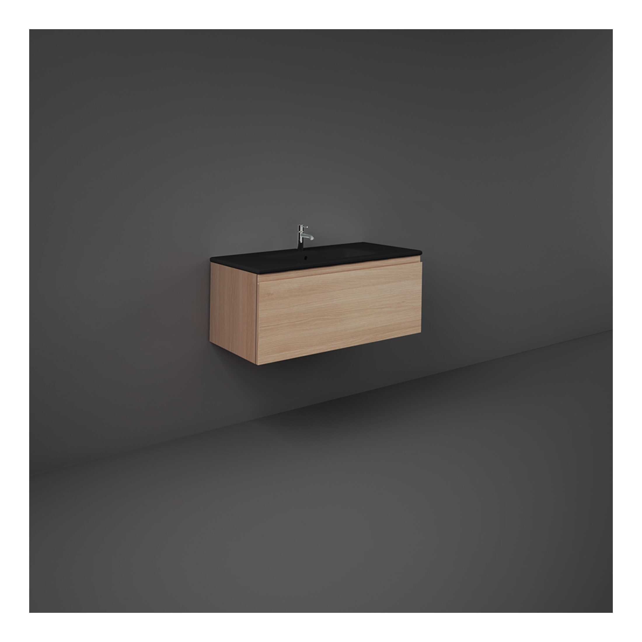 Sleek wall-mounted bathroom vanity with black countertop and minimalist design, perfect for modern bathrooms and contemporary home decor.