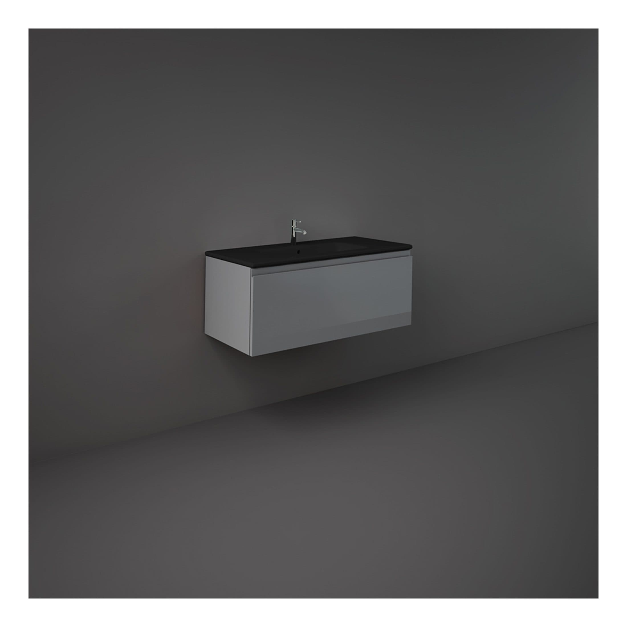 Sleek modern wall-mounted bathroom vanity with black countertop and integrated sink for contemporary bathroom designs.