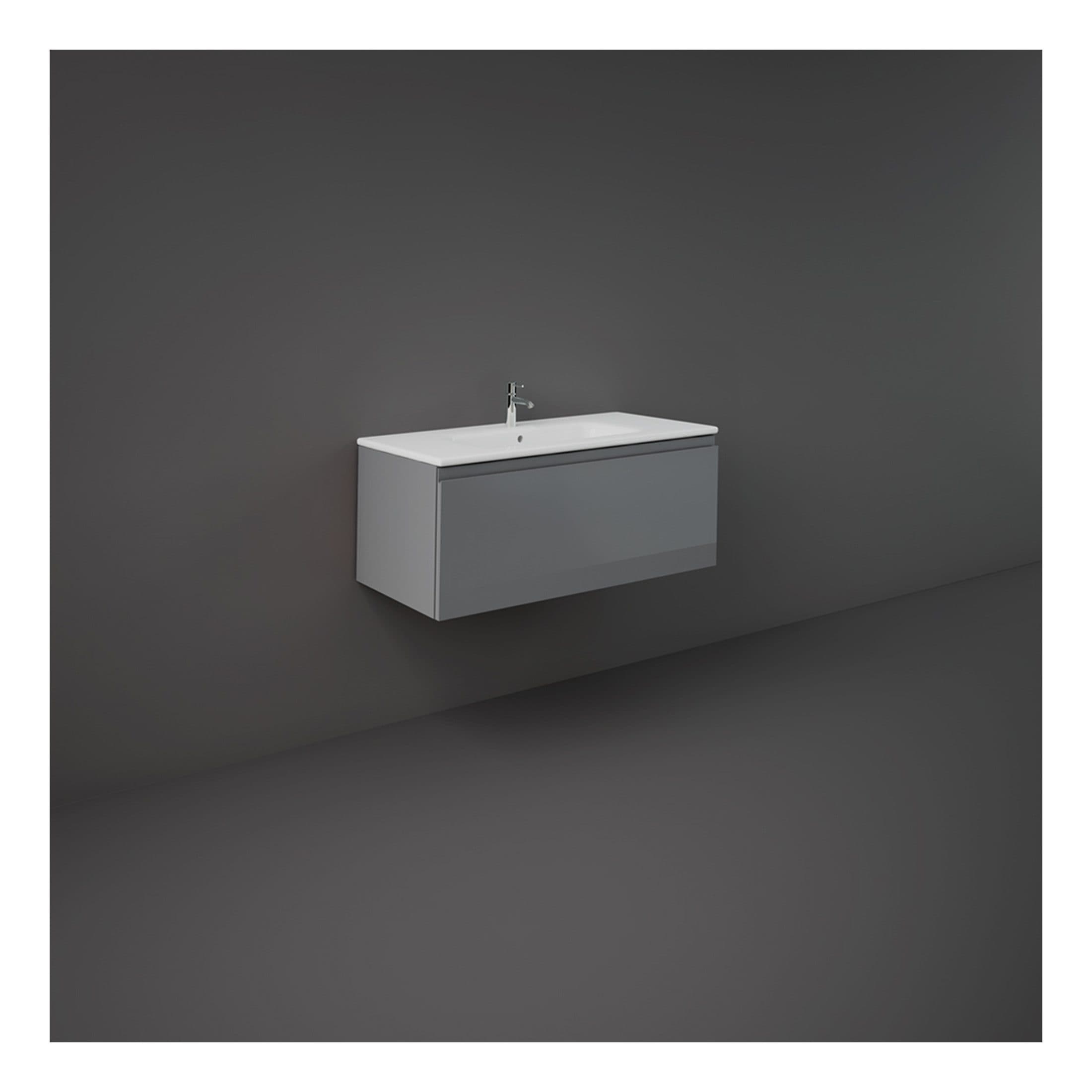 Contemporary grey bathroom vanity with integrated sink and modern tap, ideal for sleek bathroom decor and functional storage solutions. Perfect for minimalist and modern bathroom designs.
