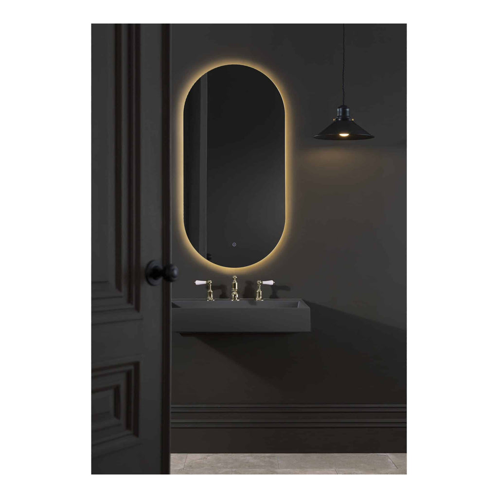 Elegant oval backlit mirror in a modern bathroom with dark wall, gold fixtures, and ambient lighting, perfect for contemporary bathroom design and creating a luxurious atmosphere.