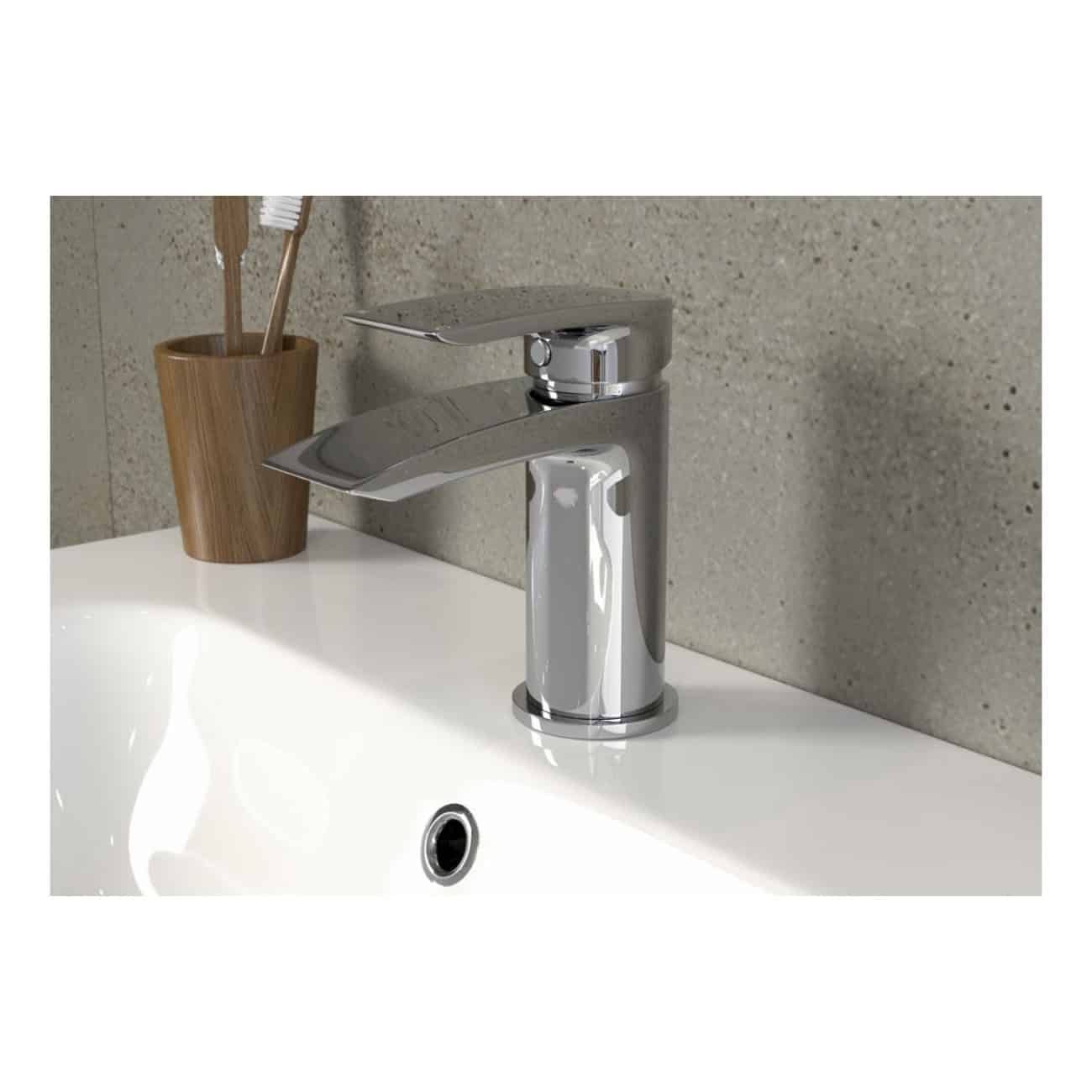 Sleek chrome bathroom sink faucet with contemporary design, mounted on a white ceramic sink against a textured beige wall, ideal for modern bathroom upgrades.