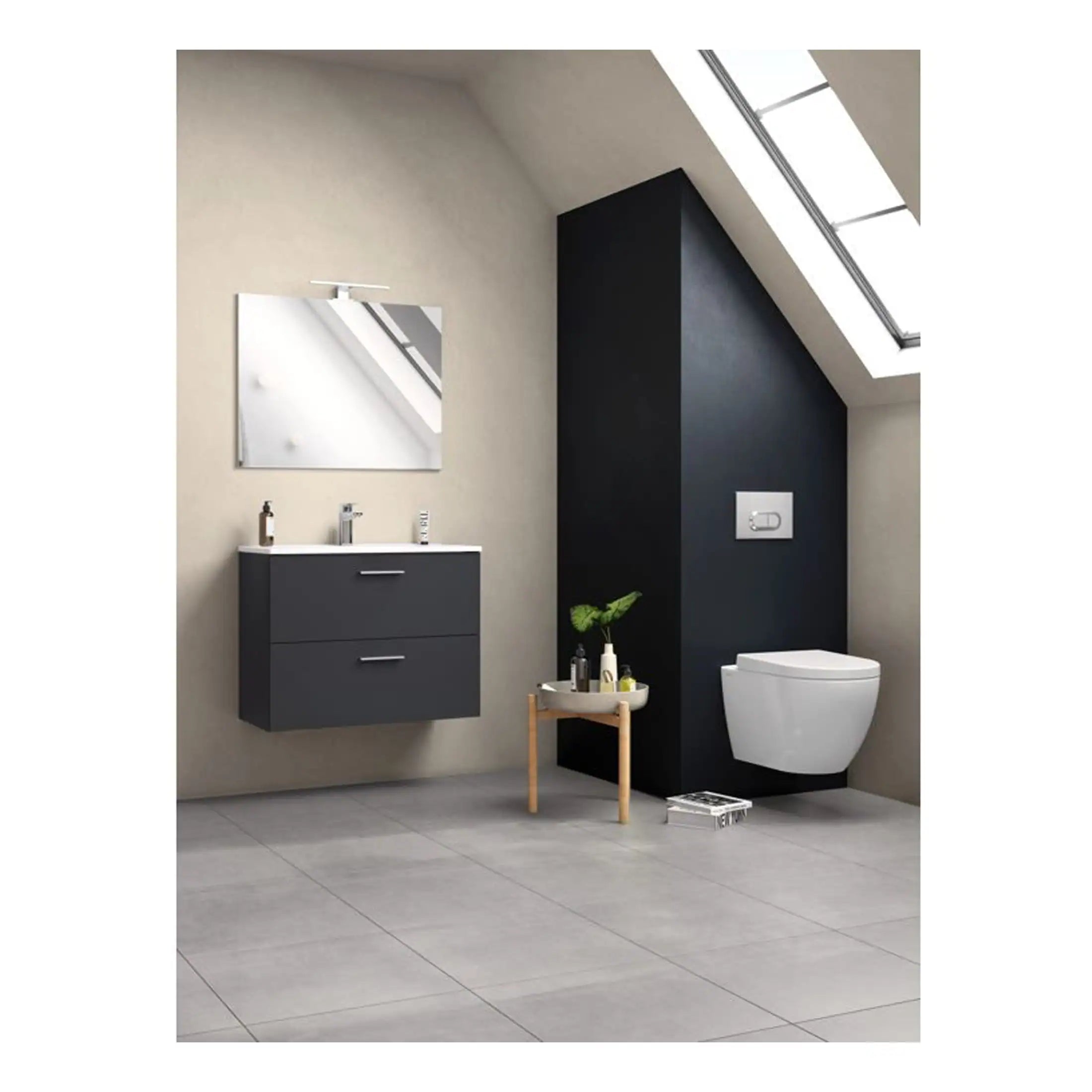 Sleek modern bathroom with floating vanity, wall-mounted toilet, and minimalist fixtures under a skylight, featuring grey and black cabinetry for contemporary bathroom design.