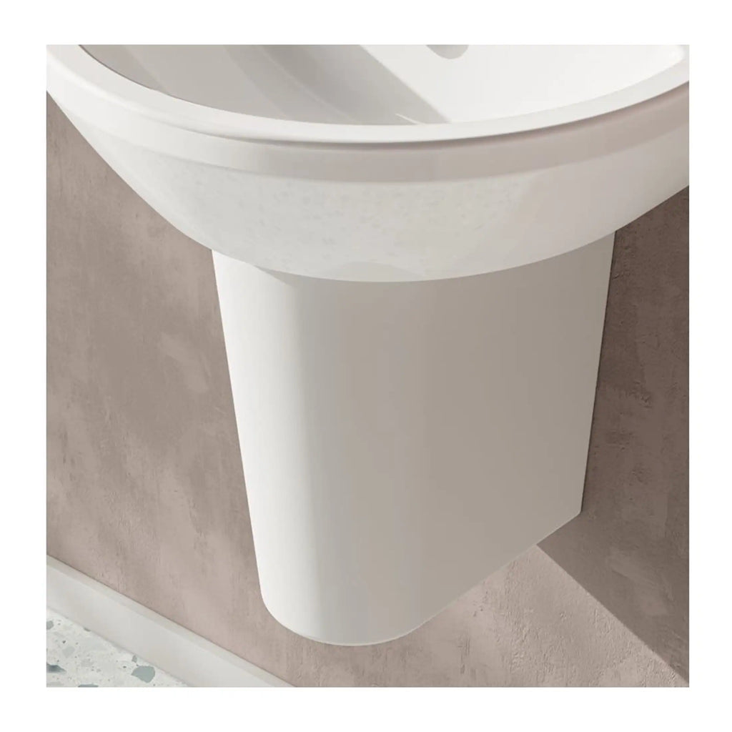 Sleek white bathroom basin with modern minimalist design, mounted on a smooth wall, ideal for contemporary bathroom interiors focusing on clean lines and space efficiency.
