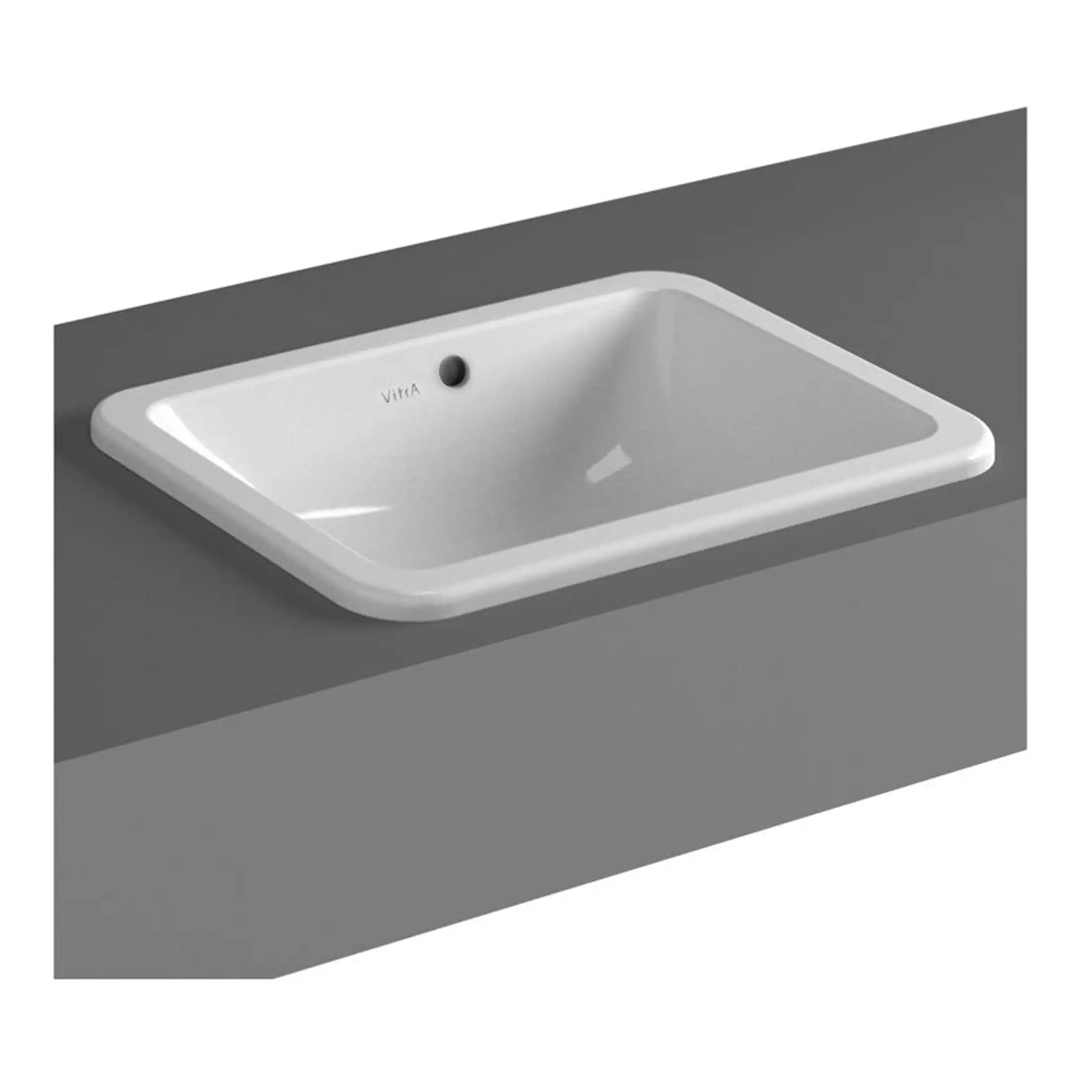 Sleek white ceramic bathroom sink mounted on grey countertop, modern design for contemporary bathrooms. Ideal for stylish washroom installations and water-saving fixtures, with a round overflow drain.