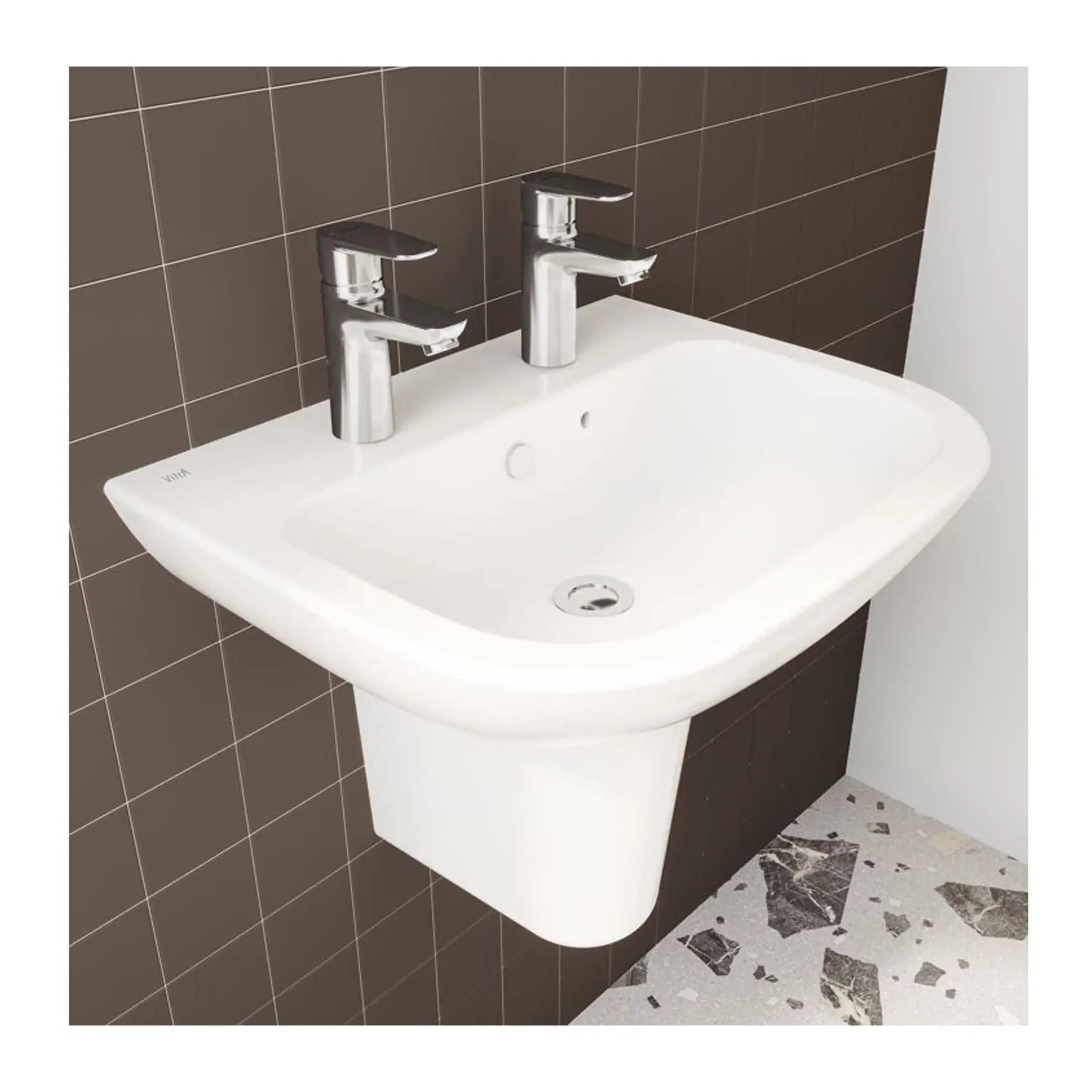 Modern white bathroom sink with dual chrome taps, wall-mounted design, set against a brown tiled wall with a terrazzo floor, ideal for contemporary bathroom decor.