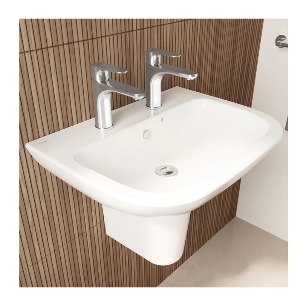 Modern white bathroom sink with dual chrome faucets on a wooden panel wall, ideal for contemporary bathroom design, offering functionality and style.