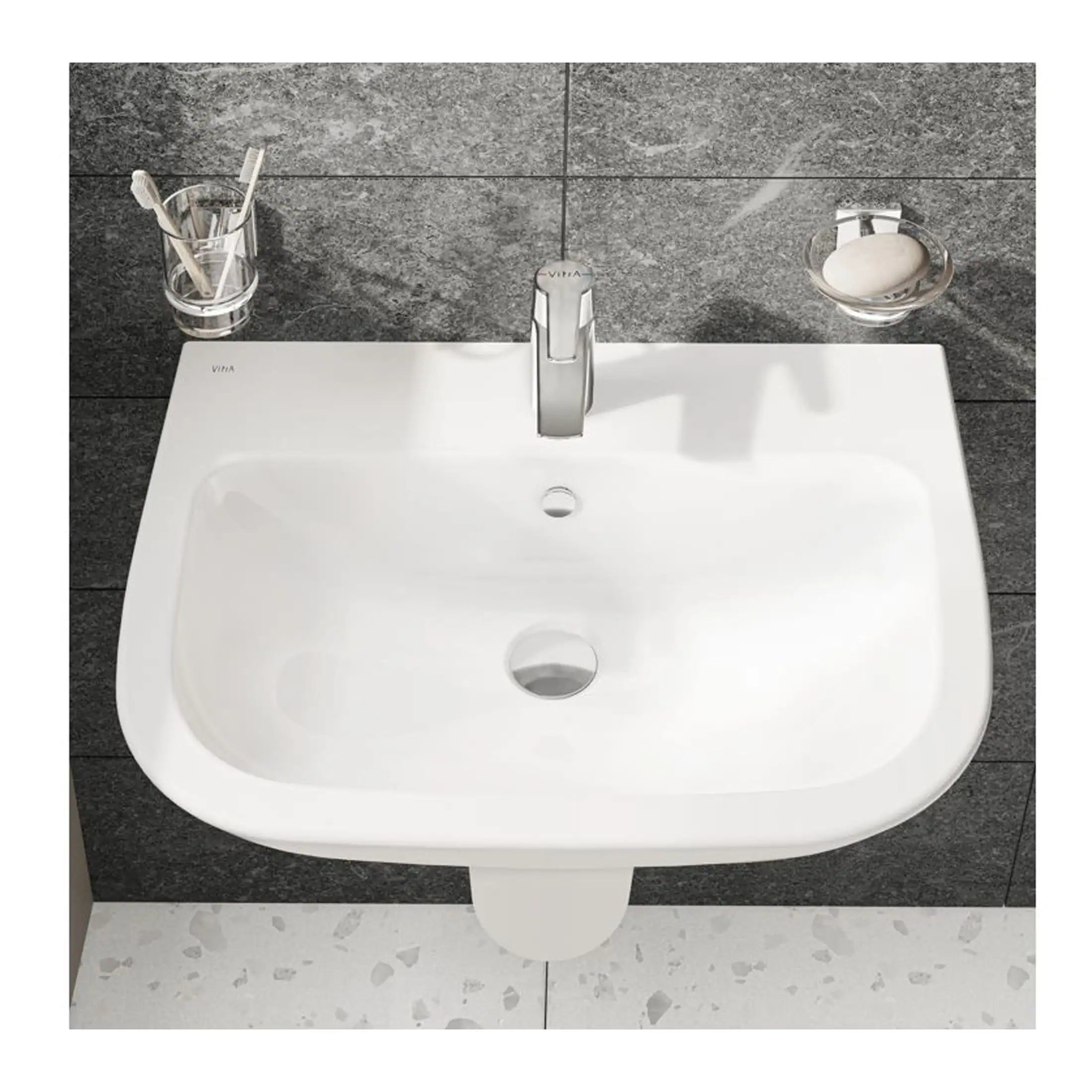 Shower wash basin with sleek modern design featuring a chrome faucet, soap dish and toothbrush holder on a grey tiled wall, ideal for contemporary bathroom interiors.