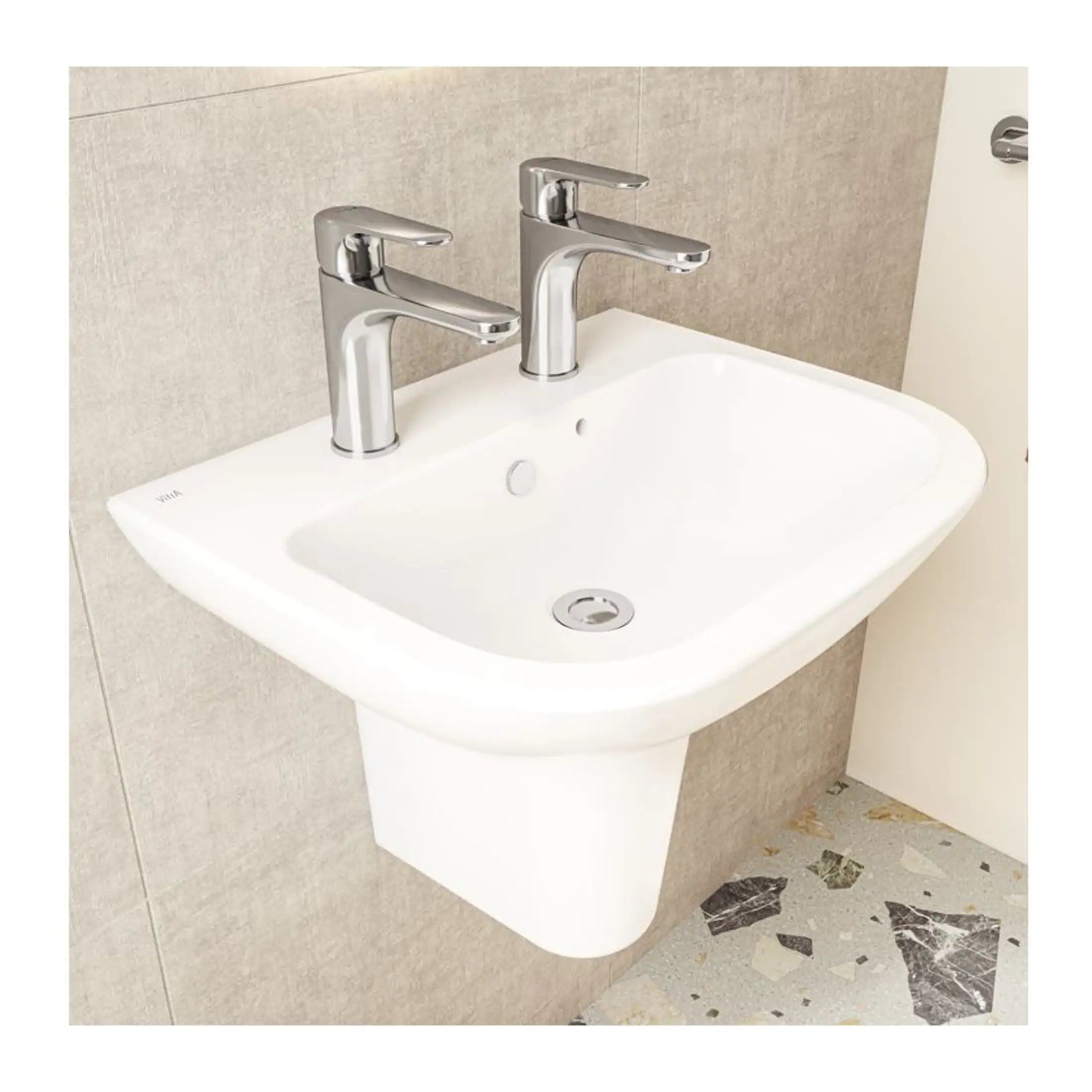 Sleek white bathroom sink with dual chrome taps, wall-mounted with smooth edges, ideal for modern bathroom design.