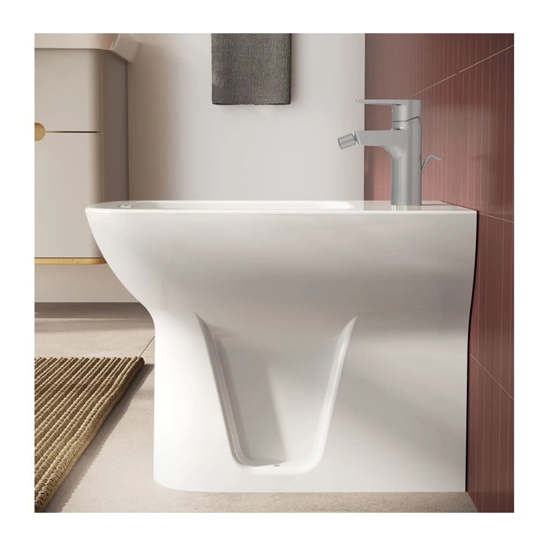 Sleek modern white bathroom washbasin with chrome tap, featuring minimalist design, set against a backdrop of brown and white tiles for contemporary bathroom décor.
