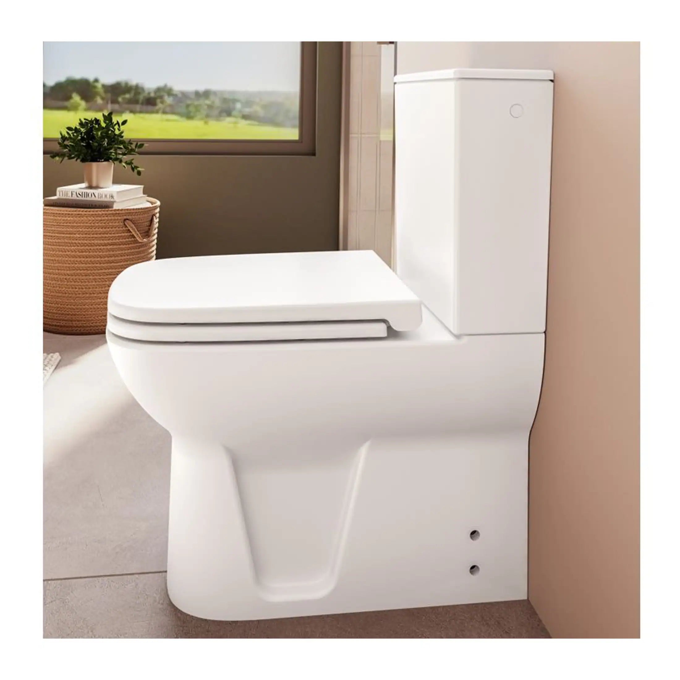 Sleek white modern toilet with concealed cistern, ideal for contemporary bathrooms and efficient space utilisation. Perfect for stylish, functional bathroom design.