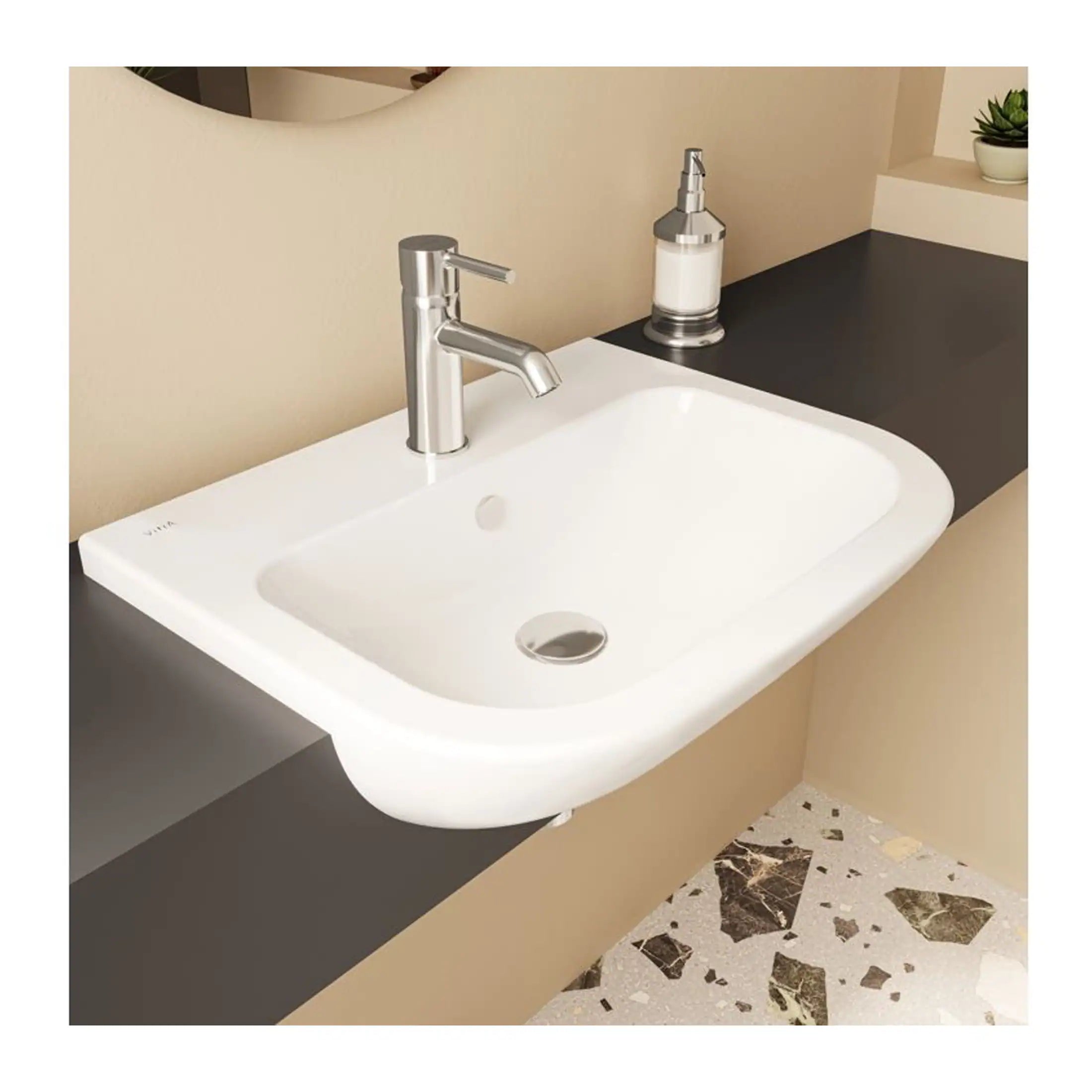 Modern white bathroom sink with sleek chrome faucet and black countertop, complemented by a soap dispenser and small potted plant, ideal for contemporary bathroom designs.