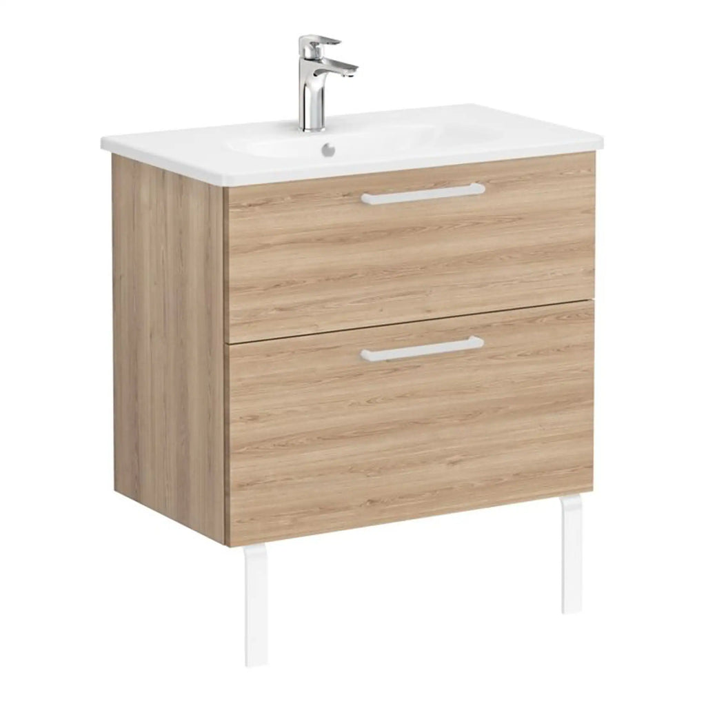 Modern bathroom vanity unit with ceramic sink and chrome tap, featuring natural wood finish drawers for bathroom storage, ideal for contemporary bathroom designs.