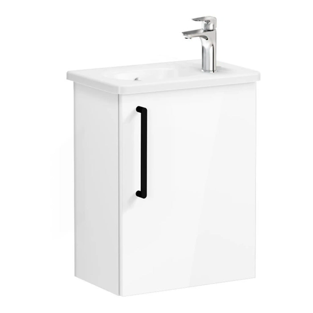 Modern white bathroom vanity with integrated sink and sleek black handle, ideal for contemporary bathroom renovation and stylish storage solutions.