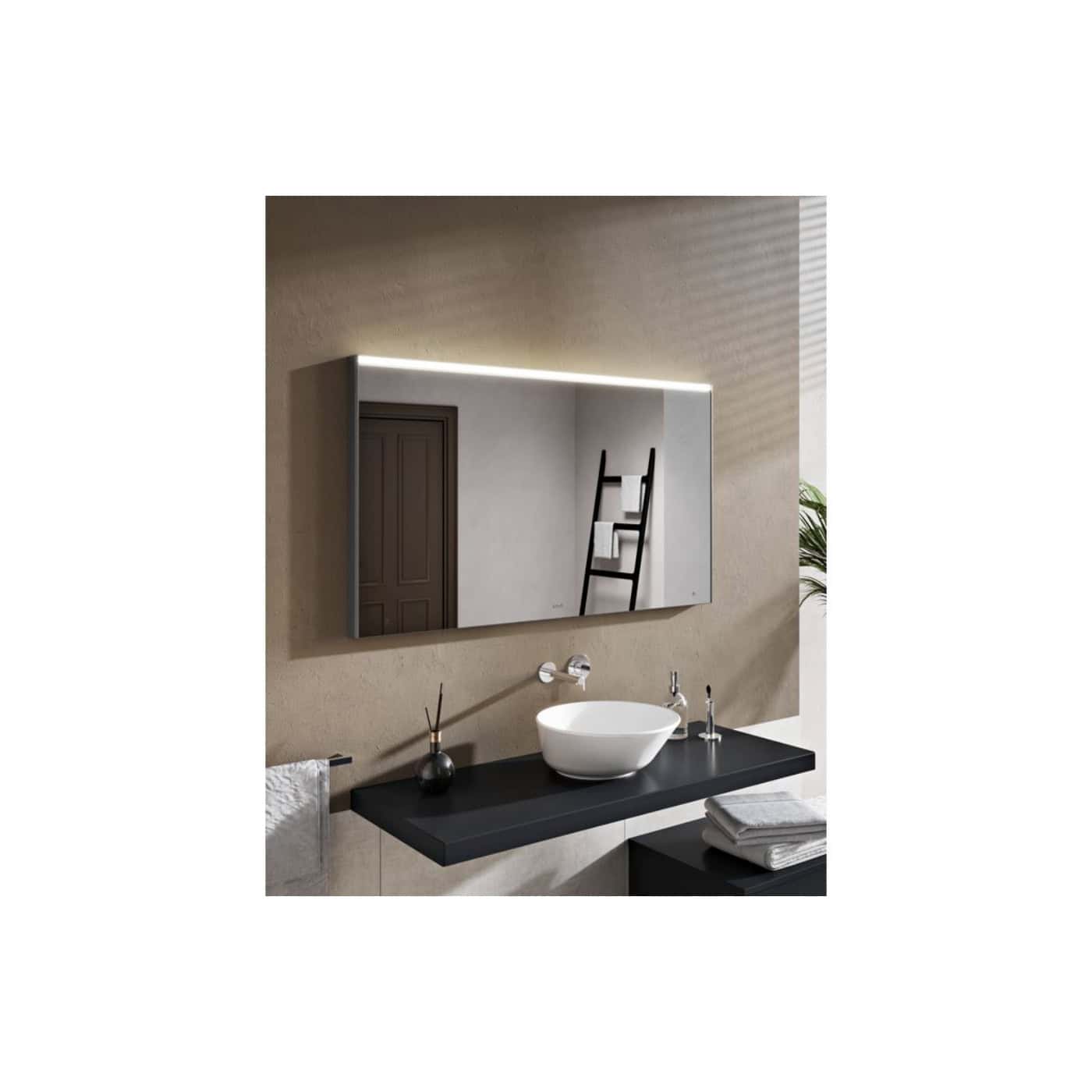 Sleek modern bathroom with a stylish wall-mounted mirror, minimalist black countertop with vessel sink, and contemporary bathroom accessories, perfect for a chic bathroom remodel.