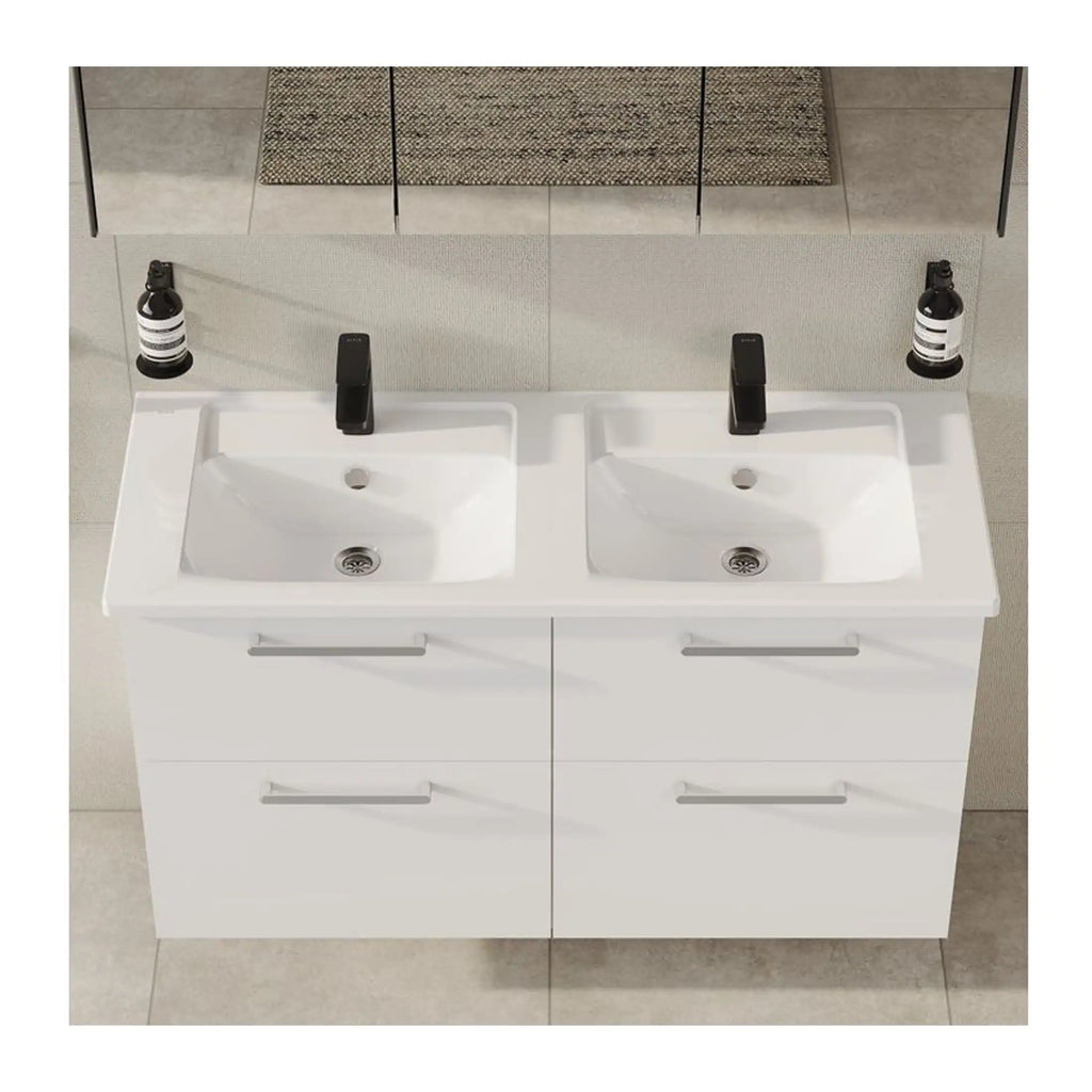 Double modern white bathroom vanity with two sinks, black taps, and a mirrored backsplash, ideal for contemporary bathroom designs and space optimisation.