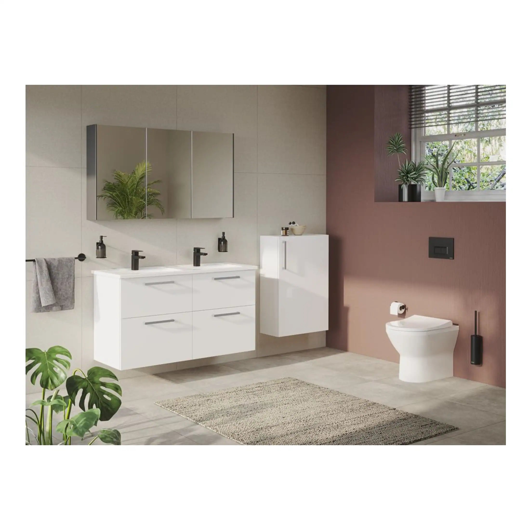 Modern white bathroom vanity with dual sinks, sleek black fixtures, large mirrored cabinet, and contemporary accessories in a stylish bathroom with beige and pink walls, indoor plants, and natural light.