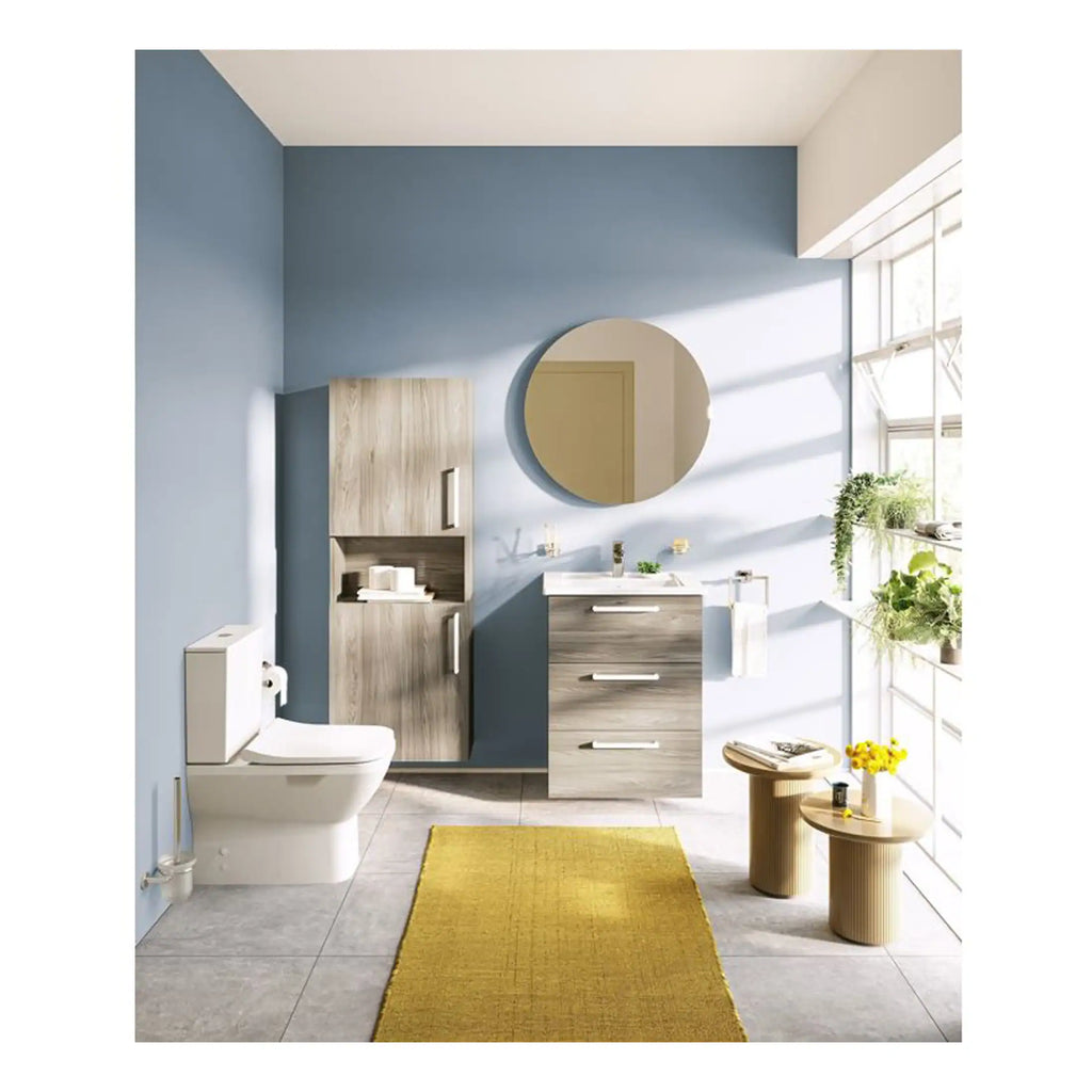 Bright modern bathroom with blue walls, wooden cabinetry, large mirror, and natural sunlight, showcasing stylish bathroom fixtures and a minimalistic design.
