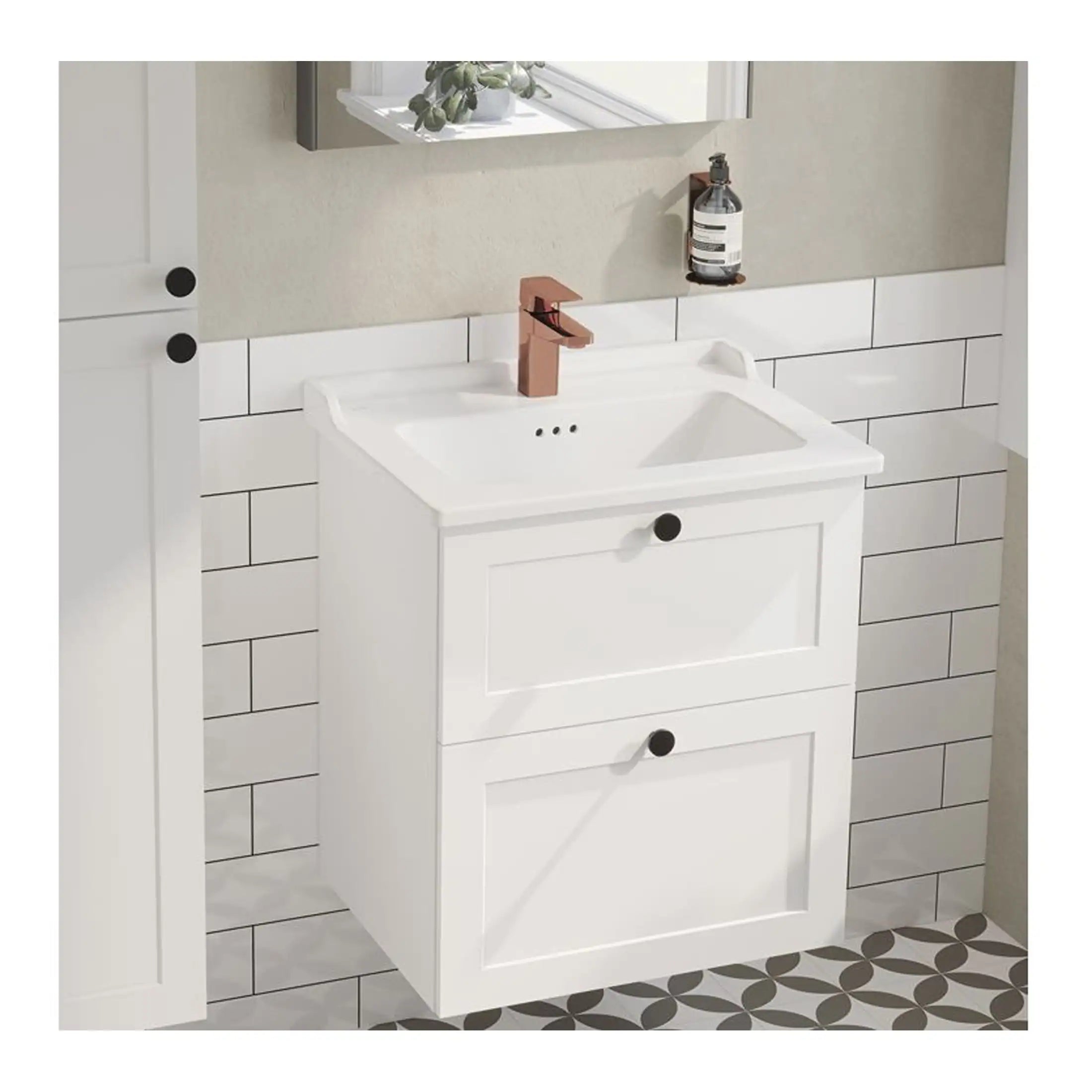 Sleek white bathroom vanity cabinet with integrated sink and copper faucet in a modern bathroom setting, featuring stylish black knobs and a patterned floor for contemporary bathroom decor.