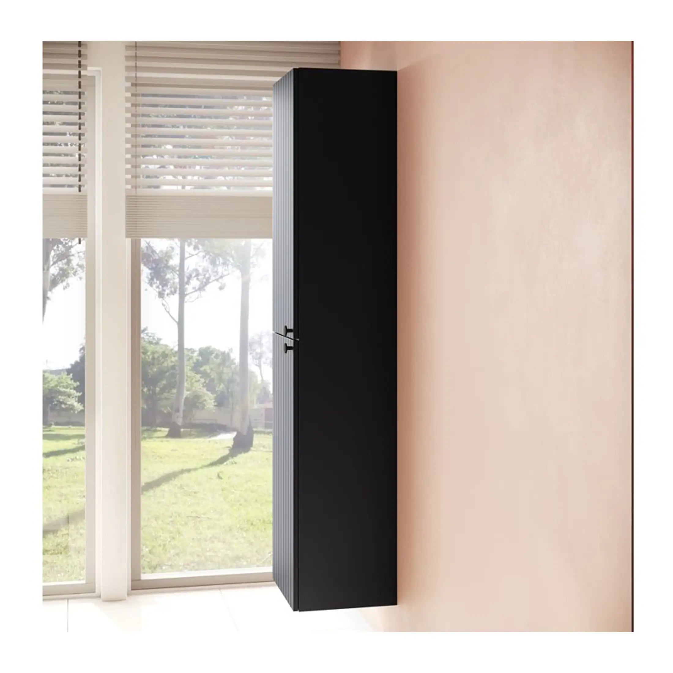 Modern black bathroom cabinet with a sleek design, fitted against a pastel peach wall, natural light from large windows enhances the minimalistic bathroom decor.