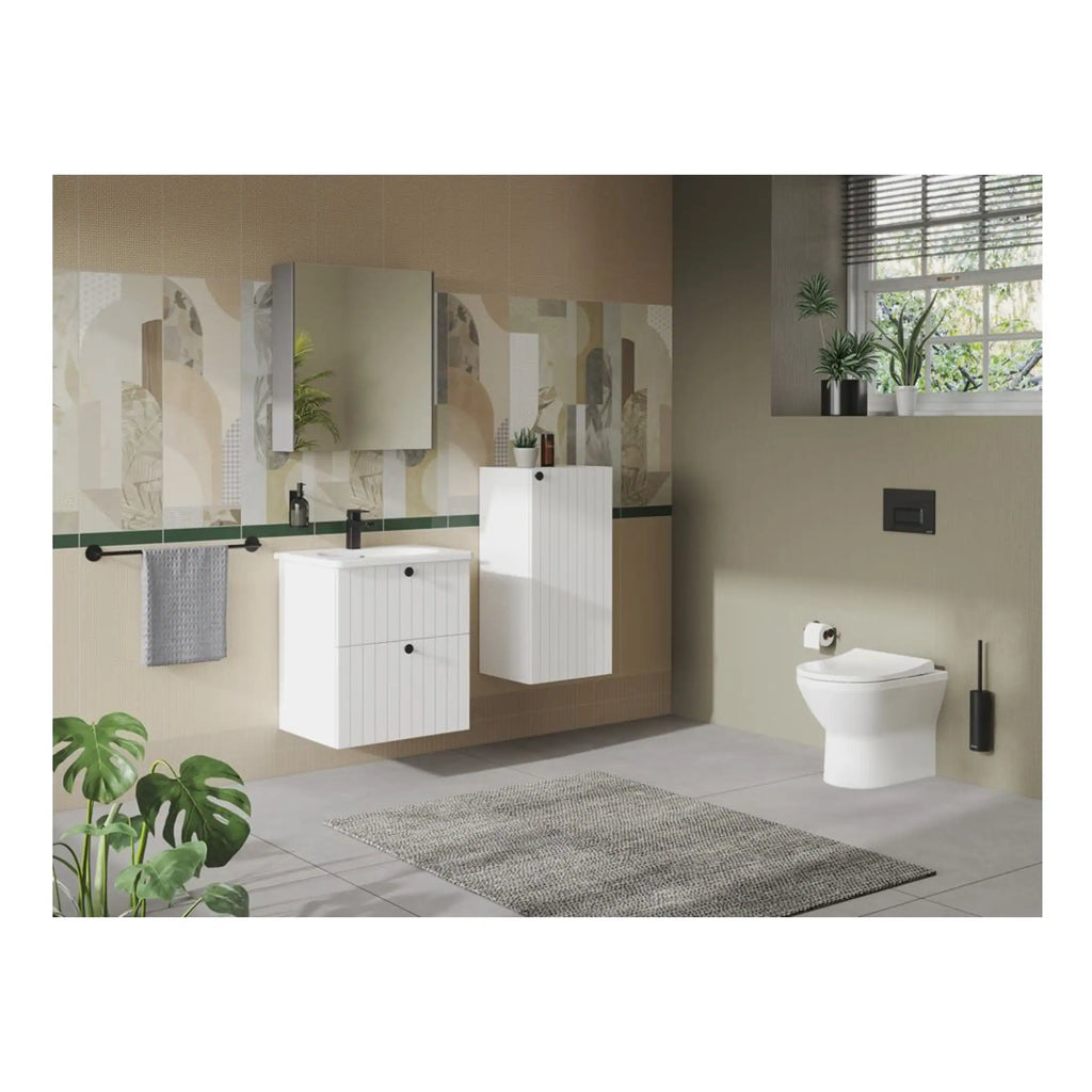Contemporary bathroom design with white hanging vanity units, a modern toilet, and decorative indoor plants, creating a sleek and functional space. Perfect for stylish bathroom renovations.