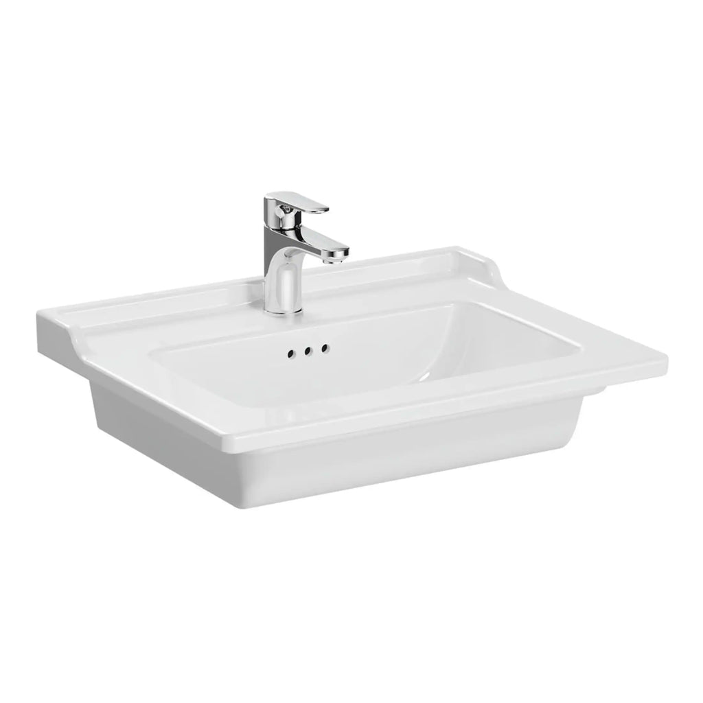 White bathroom sink with chrome faucet, ideal for modern bathroom designs and bathroom renovations. Crafted for durability and style, perfect for residential and commercial bathroom settings.