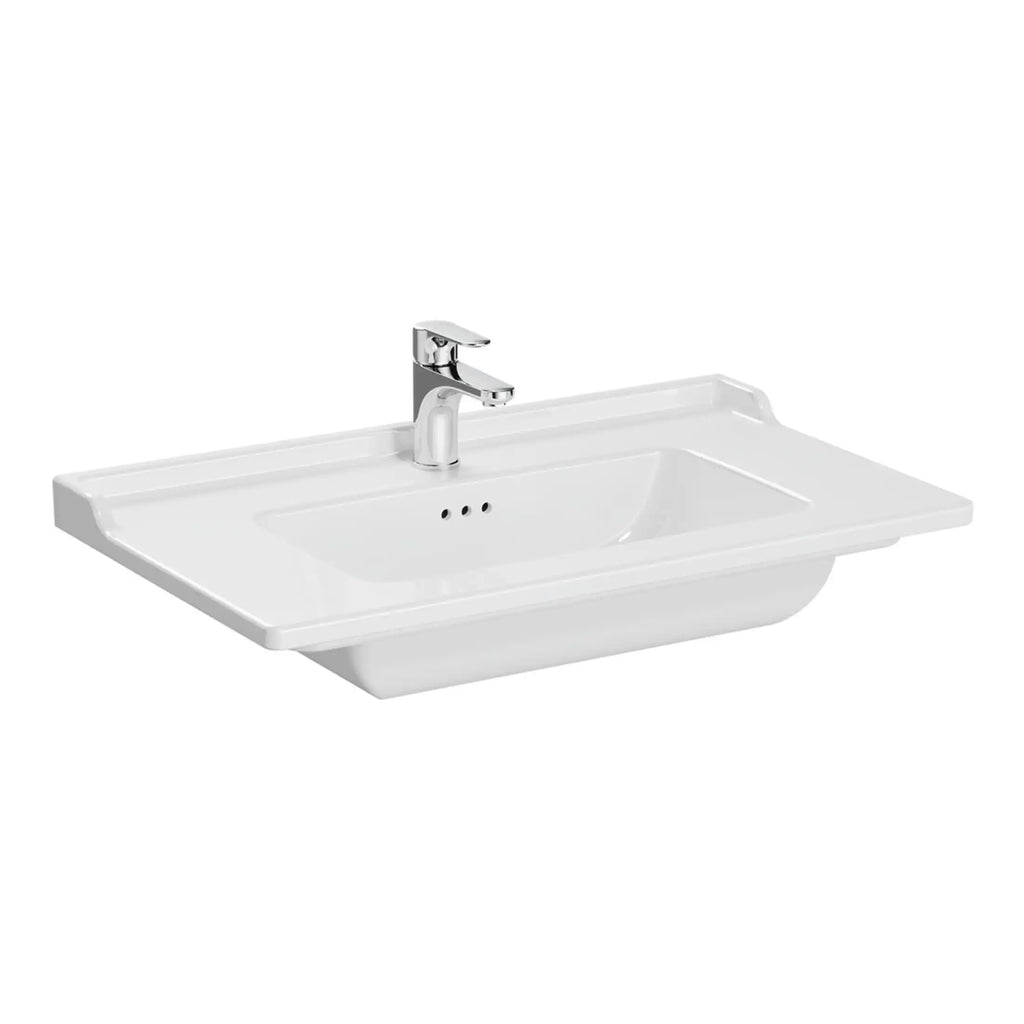 Sleek white bathroom sink with a modern chrome tap, designed for contemporary bathroom interiors, featuring a spacious basin and integrated countertop for functionality and style.