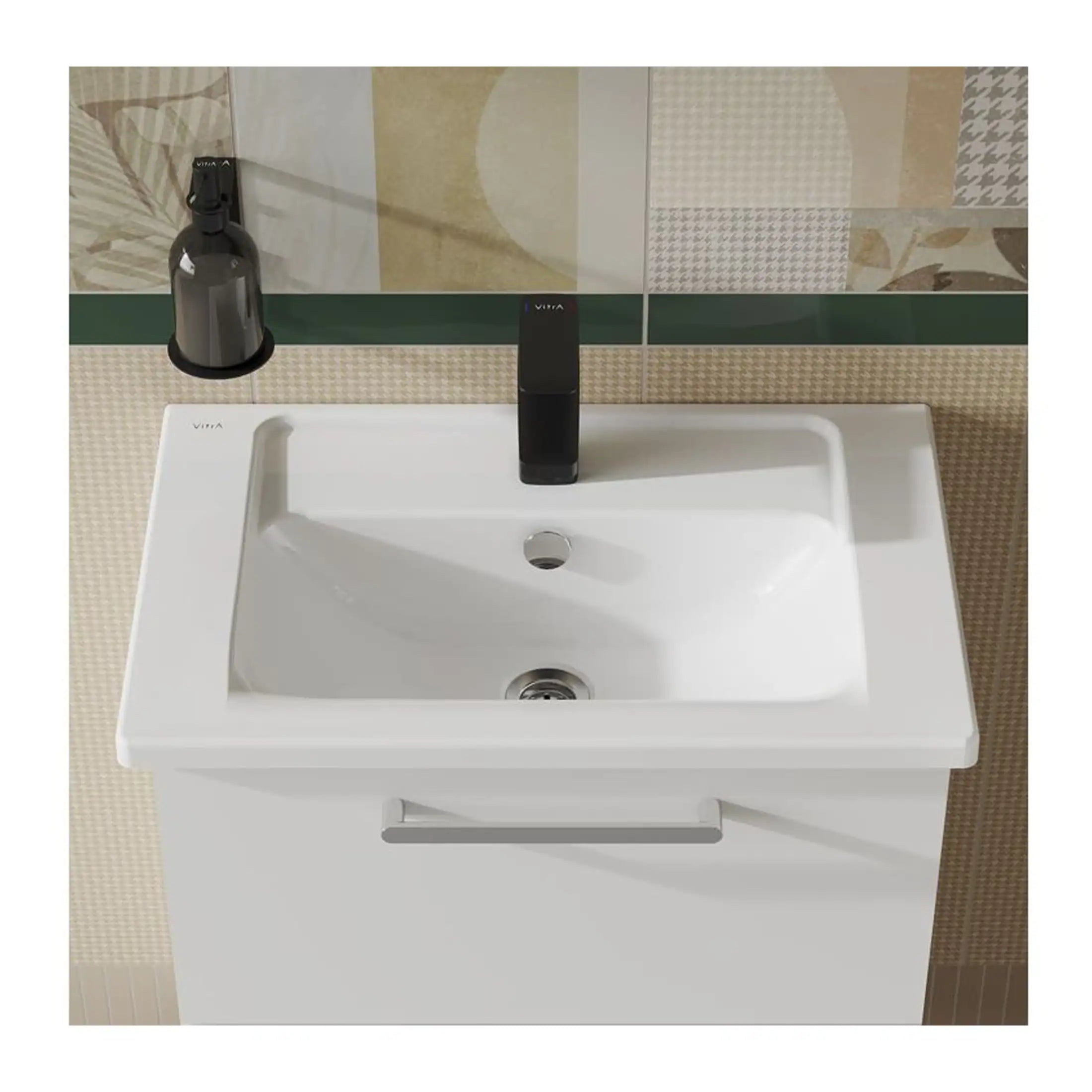 Sleek white bathroom sink with black tap and wall-mounted soap dispenser, modern design, ideal for contemporary bathrooms, featuring durable materials and a clean, minimalist aesthetic.
