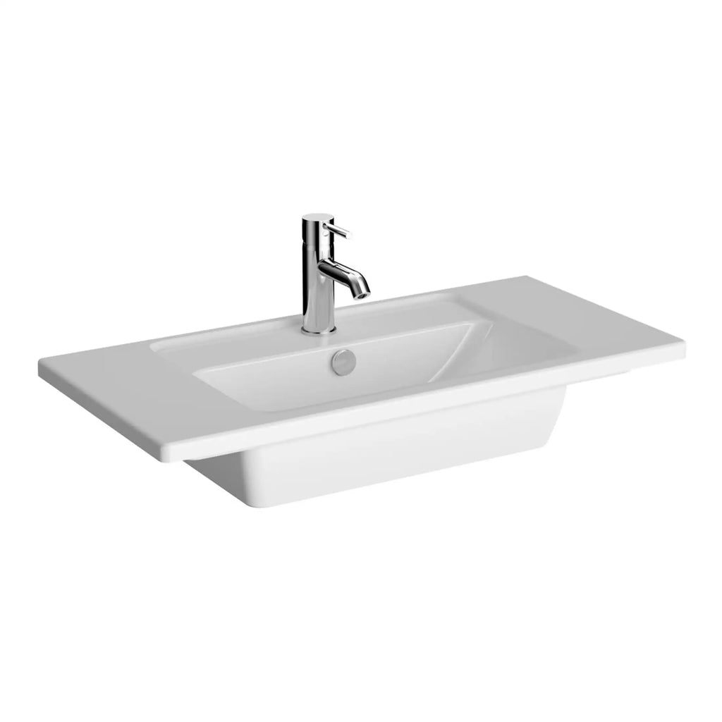 Sleek white ceramic bathroom sink with modern chrome faucet, ideal for contemporary bathroom renovations and designs.